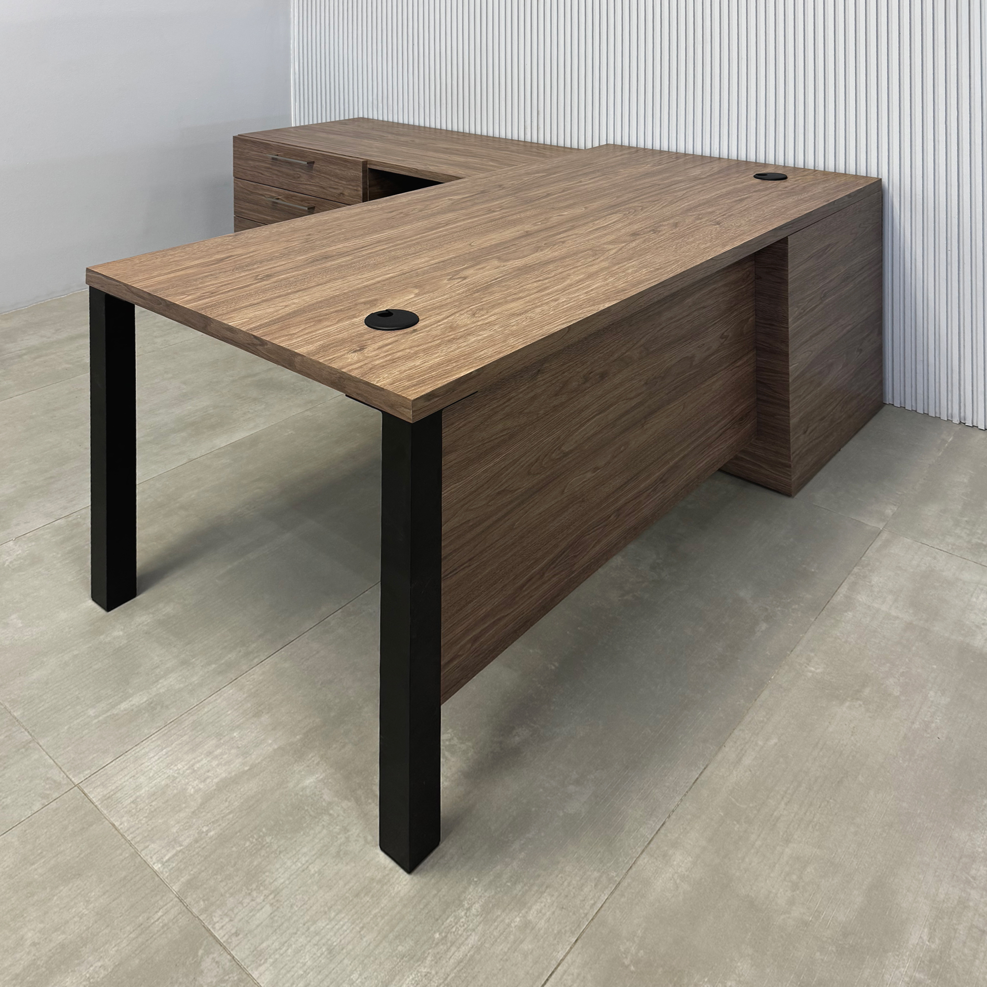 70-inch Dallas L-Shape Executive Desk with Spiced Chestnut Matte laminate top, Spiced Chestnut  Matte laminate base & storage, and black stone palazzo laminate panel.