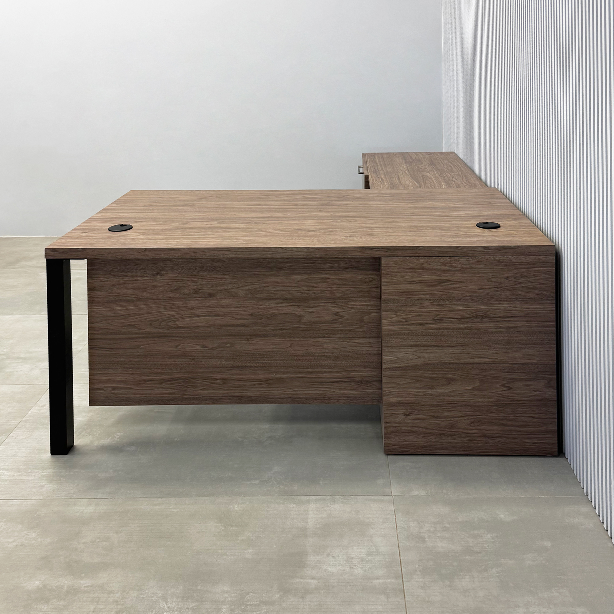 70-inch Dallas L-Shape Executive Desk with Spiced Chestnut Matte laminate top, Spiced Chestnut  Matte laminate base & storage, and black stone palazzo laminate panel.