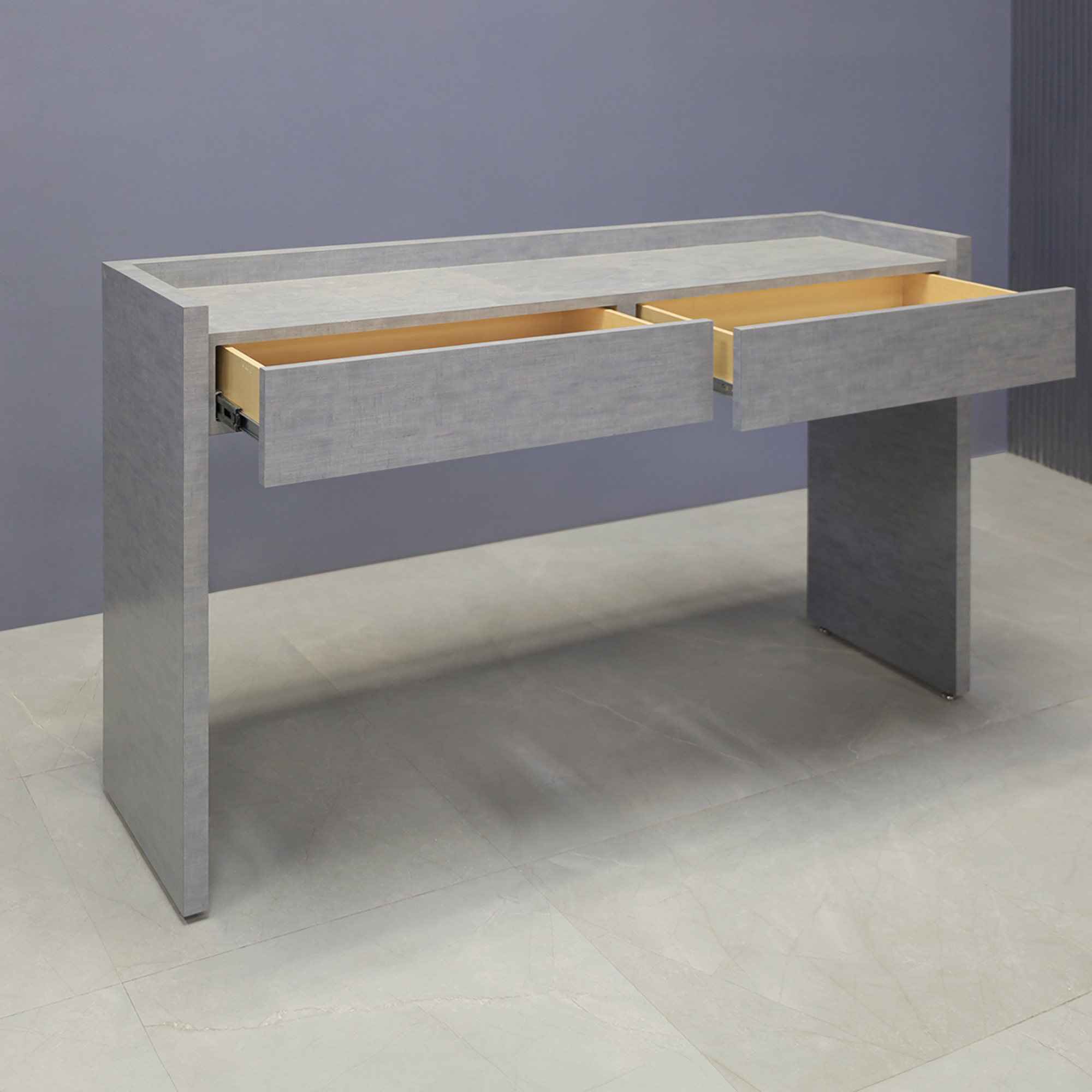 60-inch Avenue Console Table in silver alchemy matte laminate console, shown here.