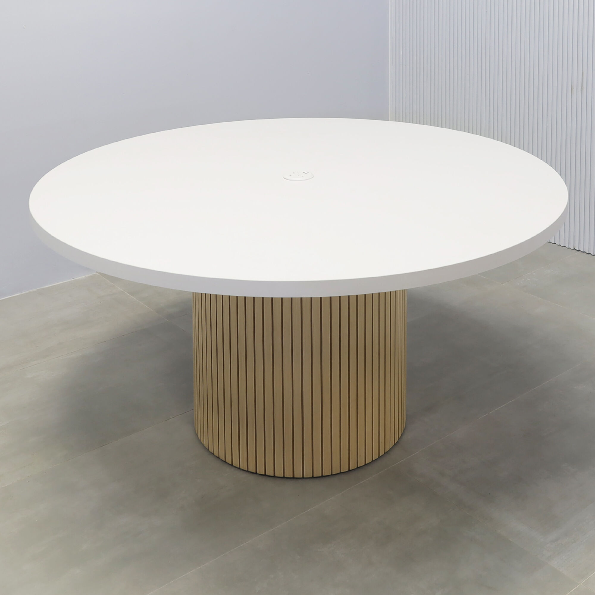 60-inch Newton Round Conference Table with white matte laminate top, maple tambour base, Mx1 in white power box.