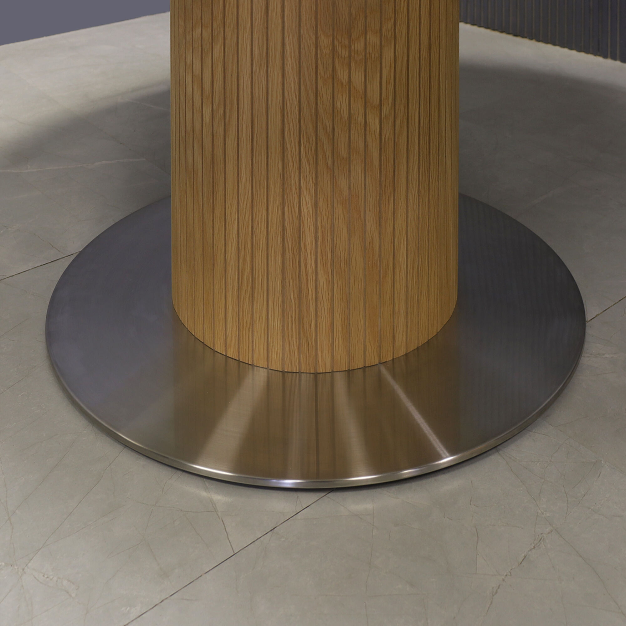 60-inch Newton Round  With Laminate Top in white matte laminate, white oak tambour pedestal, and silver metal powder-coated base.
