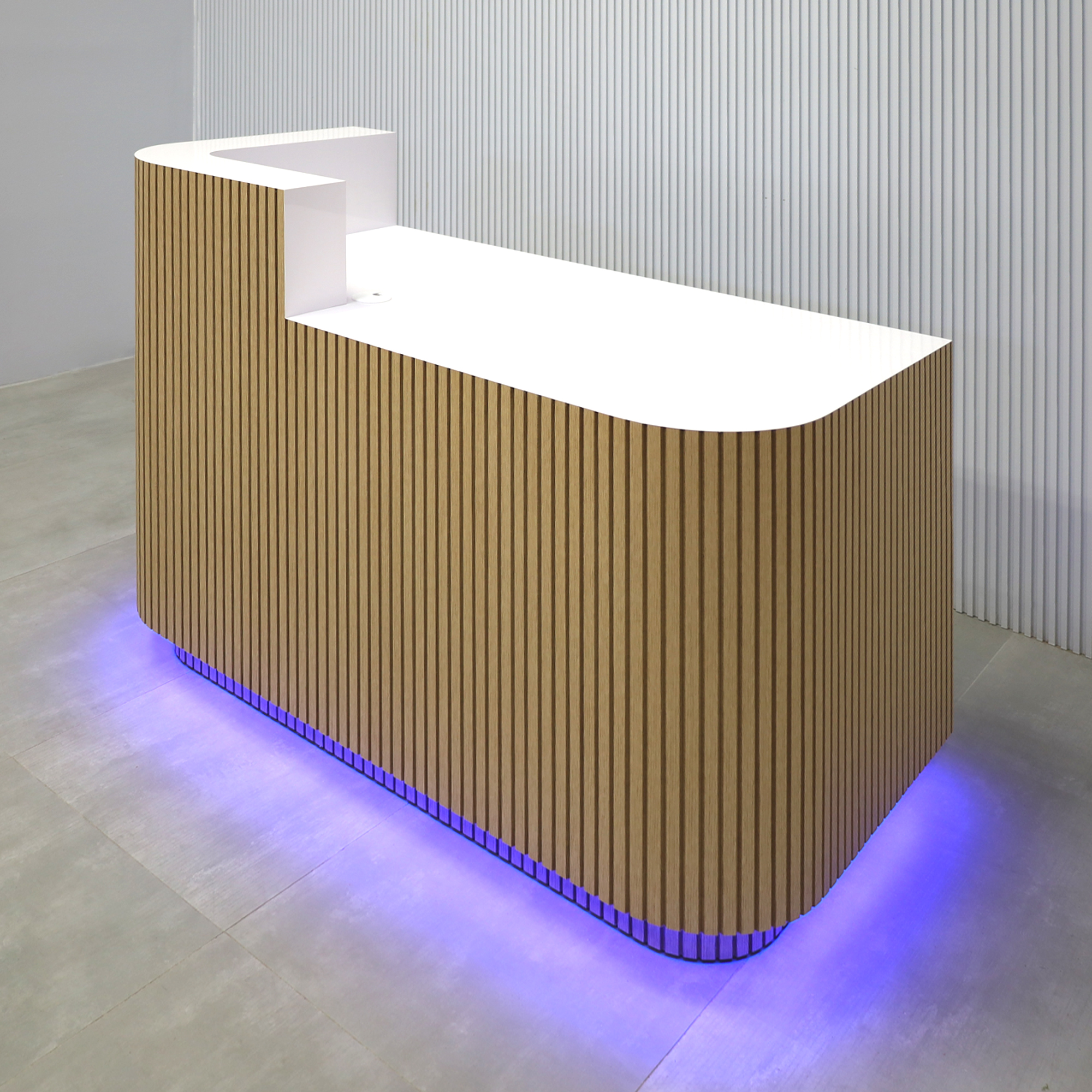 60-inch Nola ADA L-Shape Reception Desk with white oak tambour counter & top, white gloss laminate workspace, white oak tambour toe-kick, and color LED.