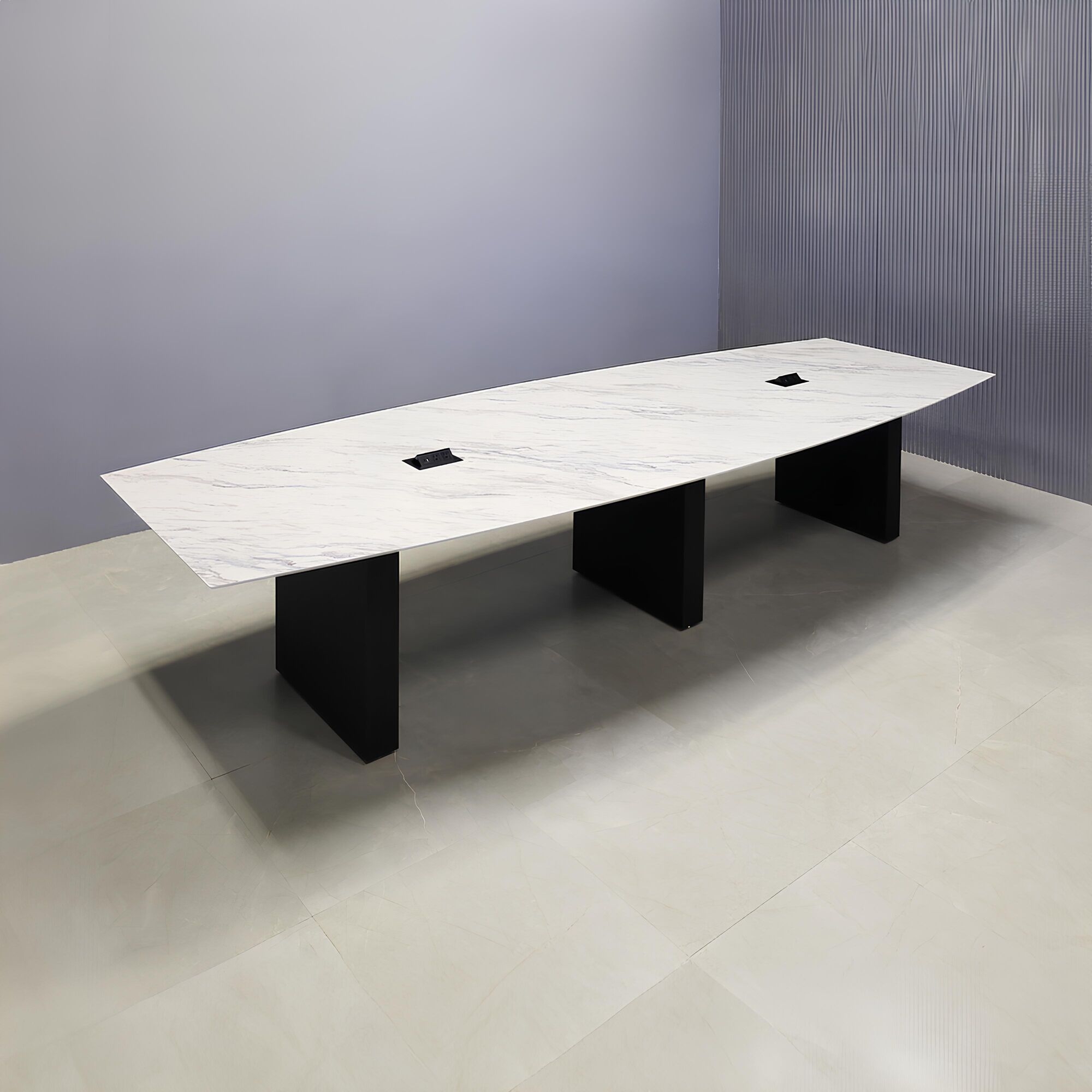 120-inch Aurora Boat Conference Table in 1/2-inch Calcutta blanc engineered surface top, black traceless laminate standard base, and 2 black MX2 power boxes.