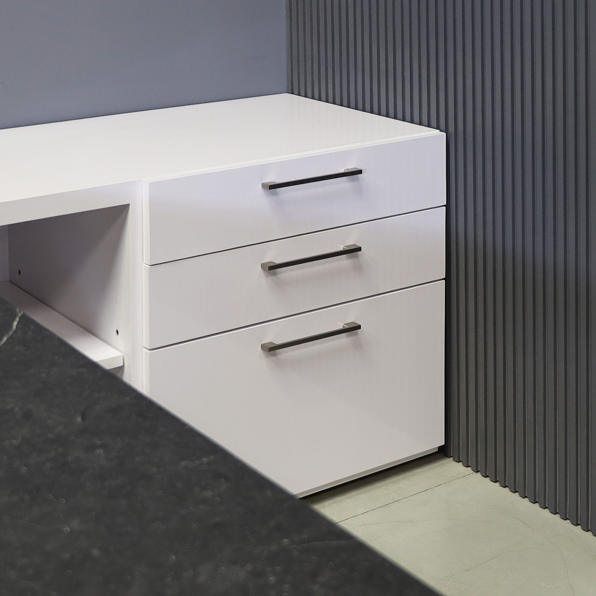 72-inch Avenue Curved Executive Desk w/ Credenza in black stone PVC top and white gloss laminate base, credenza and privacy panel, shown here.