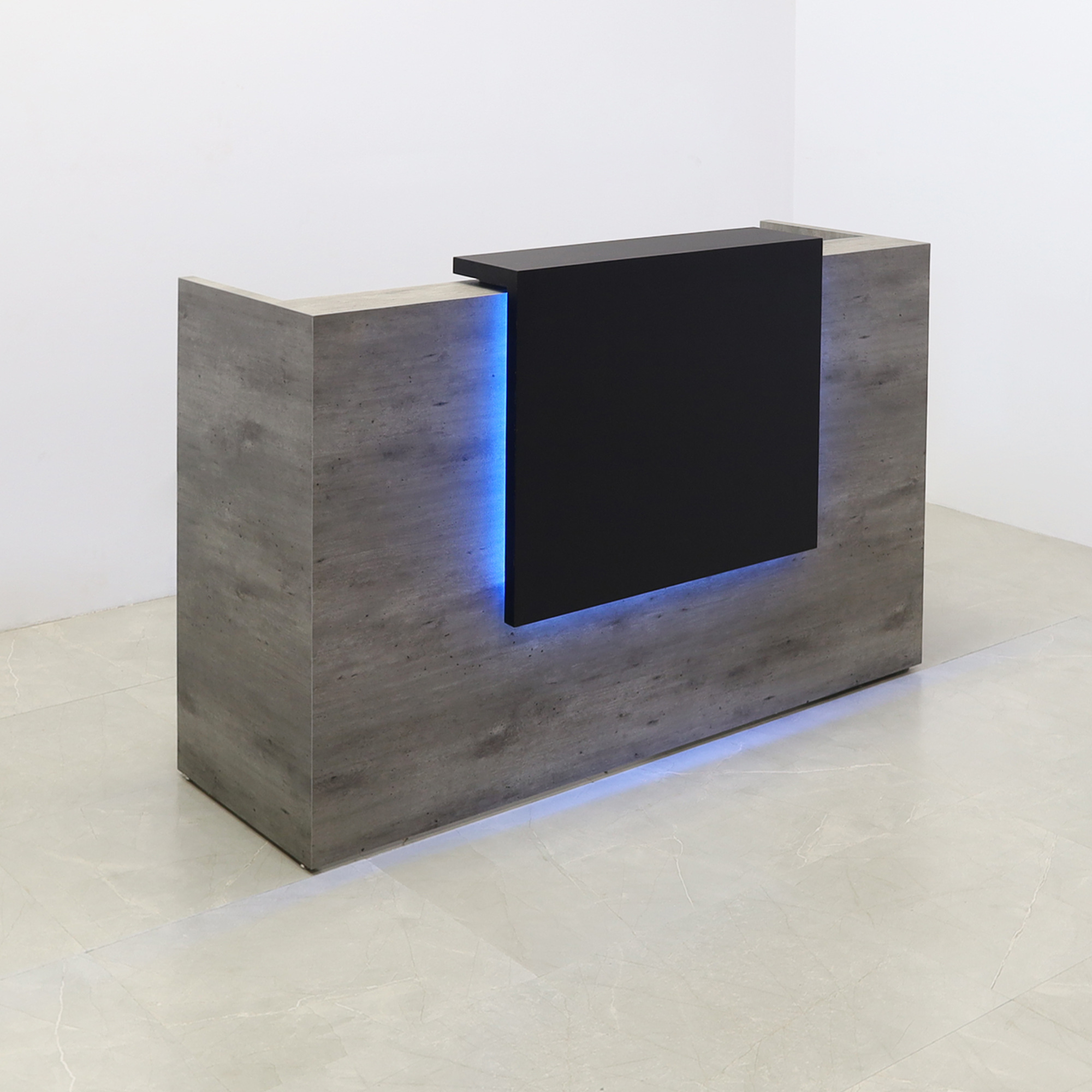 72-inch Chicago Custom Reception Desk in black traceless laminate counter and concrete PVC desk, with color LED, shown here.