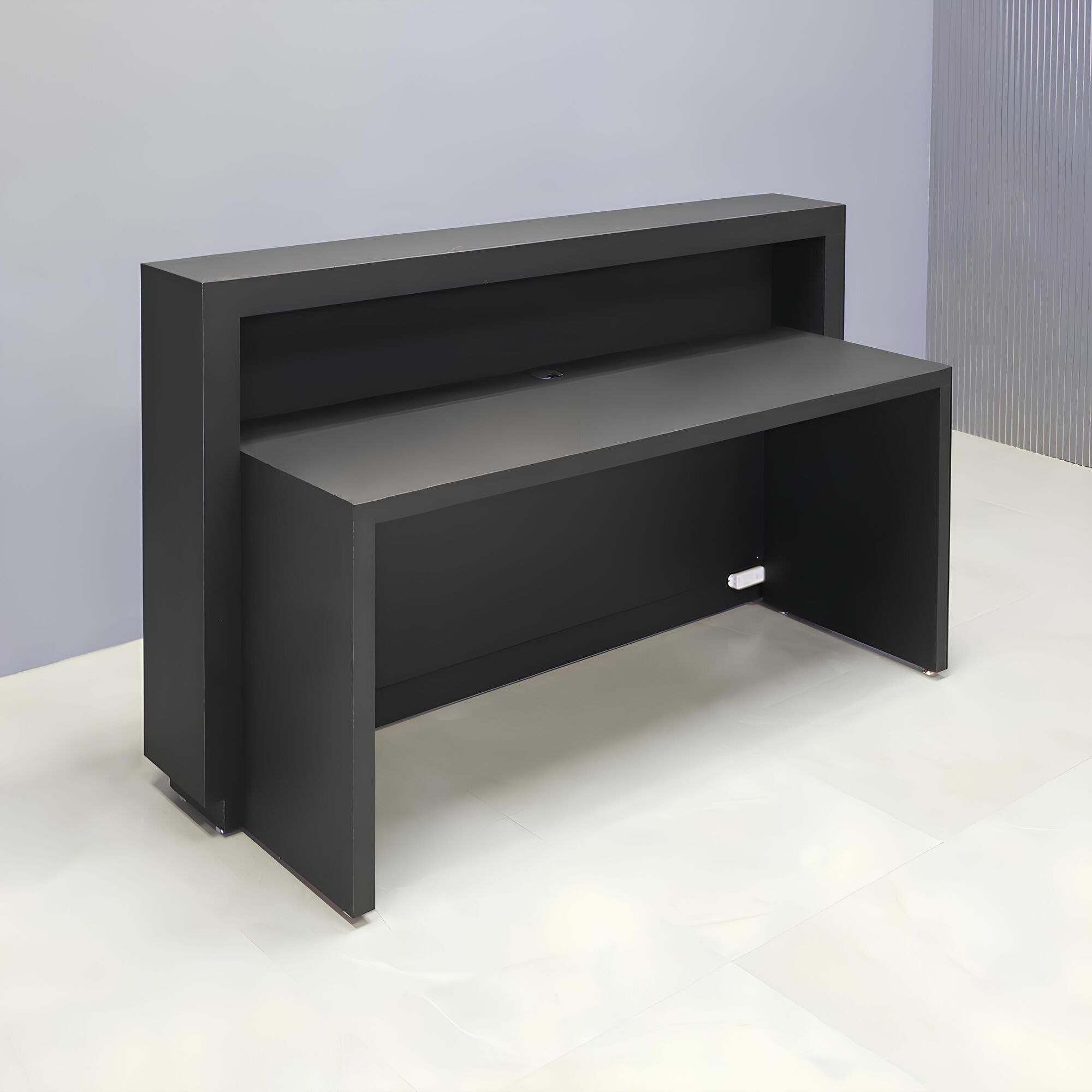 72-inch Vegas Designer Reception Desk in black traceless laminate main desk, spanish limestone engineered surface slats front panel, and warm white LED.