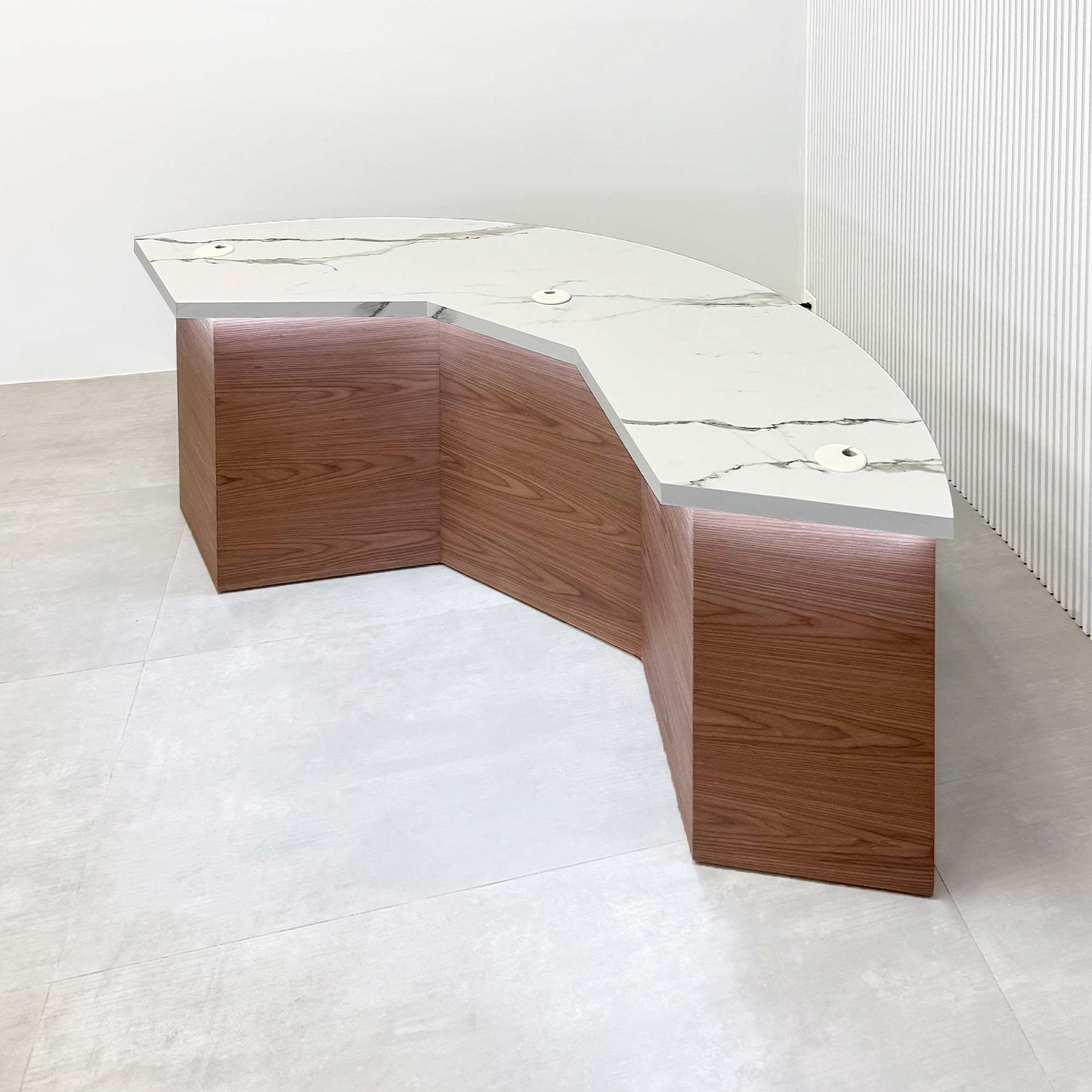72-inch Tampa Bay Custom Handmade Podcast Table with calcutta stone PVC laminate top, walnut wood veneer front of the base, storm gray matte laminate back of the base, and white warm LED.