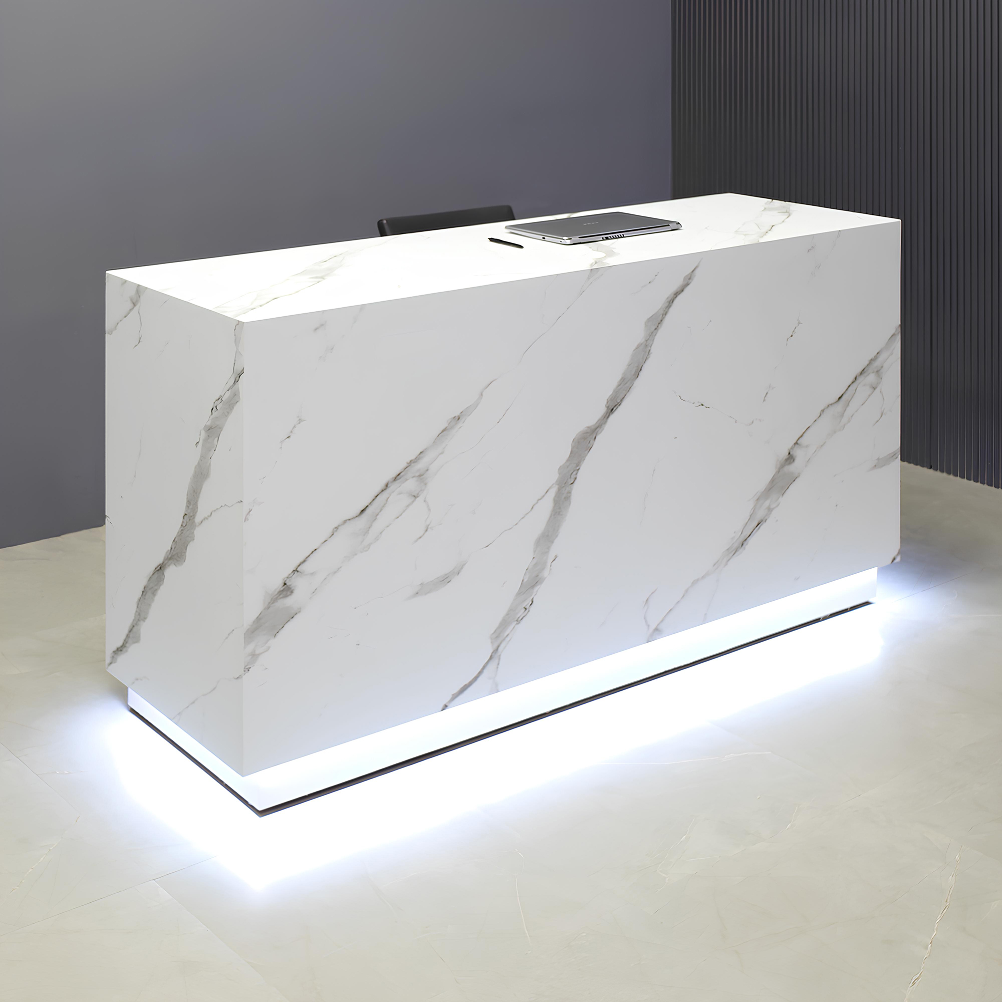 72-inch Houston Retail Custom Reception Desk in calcutta stone PVC main desk, brushed aluminum toe-kick, and warm white changing LED.