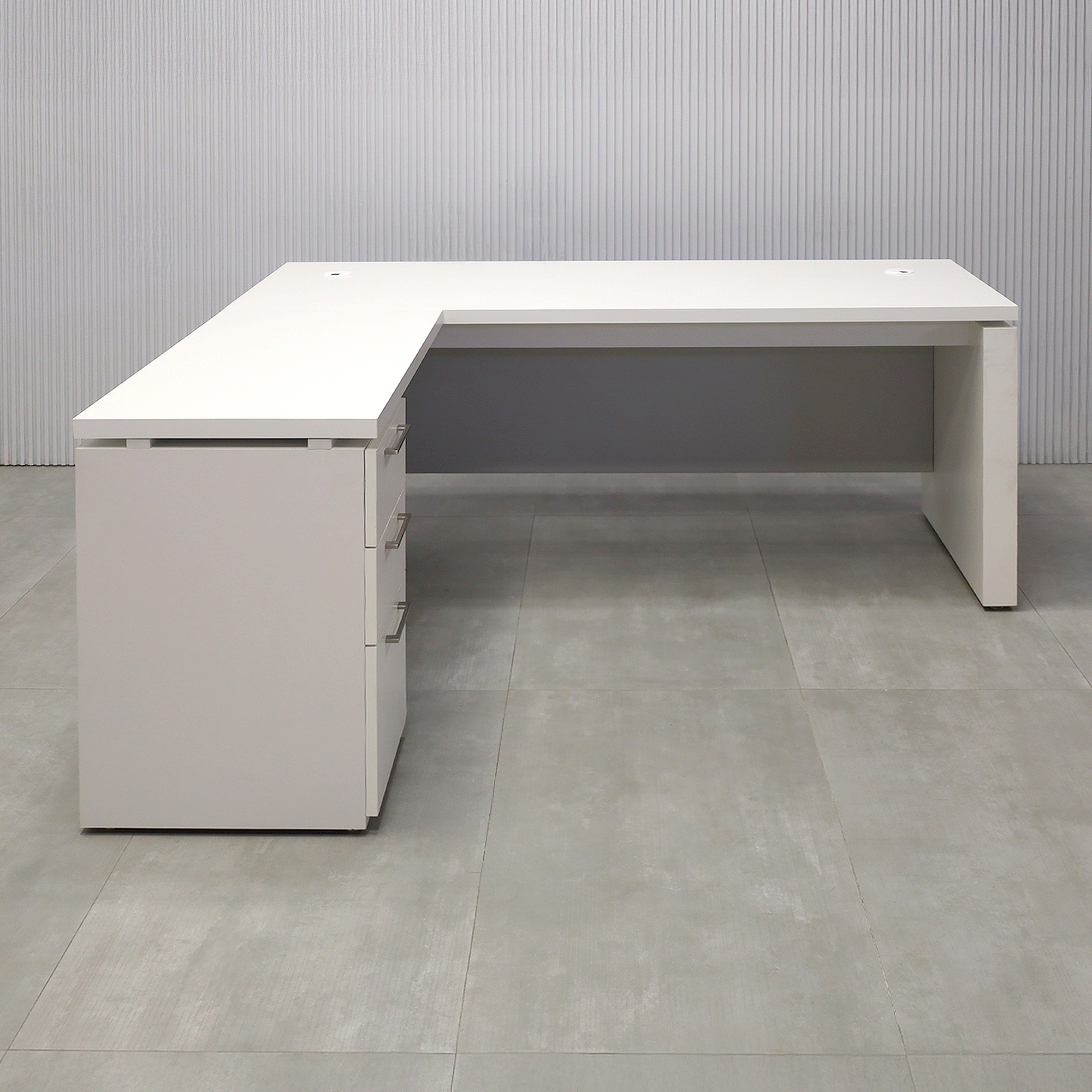 72-inch Denver L-Shape Executive Desk with Dover Off-White matte laminate top, base & cabinets. Folkstone Gray matte laminate privacy panel. 