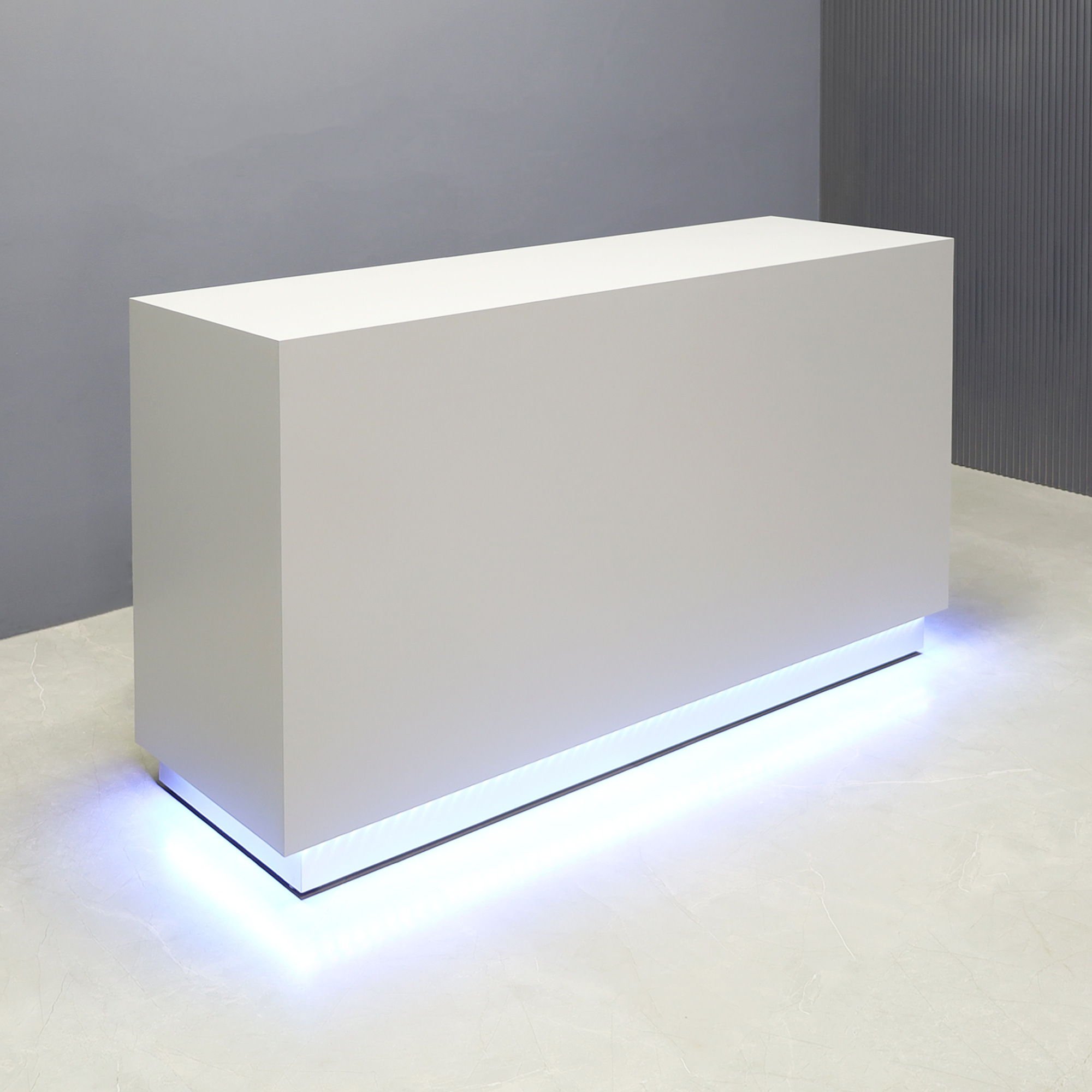 72-inch Houston Custom Reception Desk in folkstone gray matte laminate main desk and brushed aluminum toe-kick, with white LED, shown here.