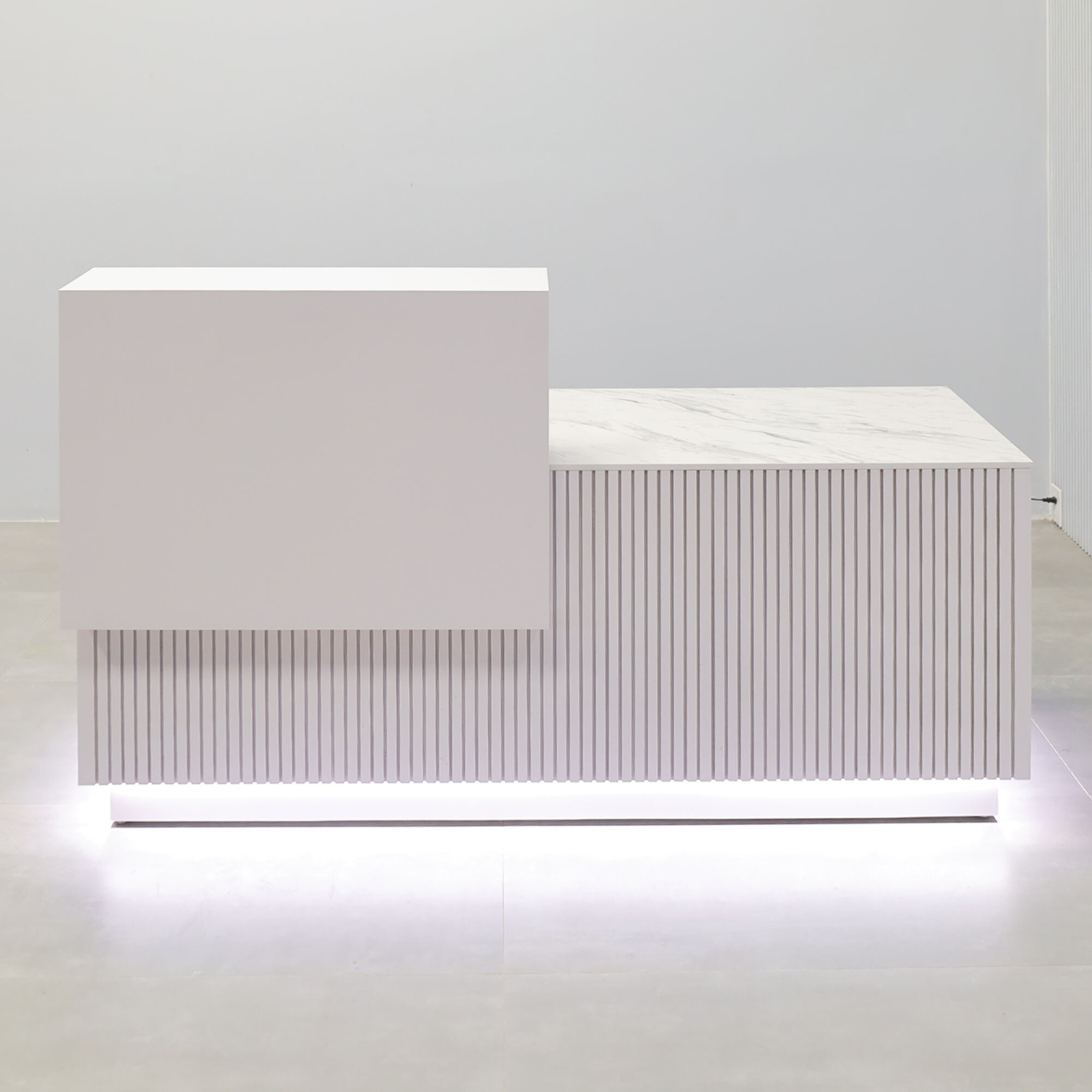72-inch Los Angeles Reception Desk with  white matte laminate counter & toe-kick, white matte tambour with natural mdf desk, calcutta stone engineered surface desk top.