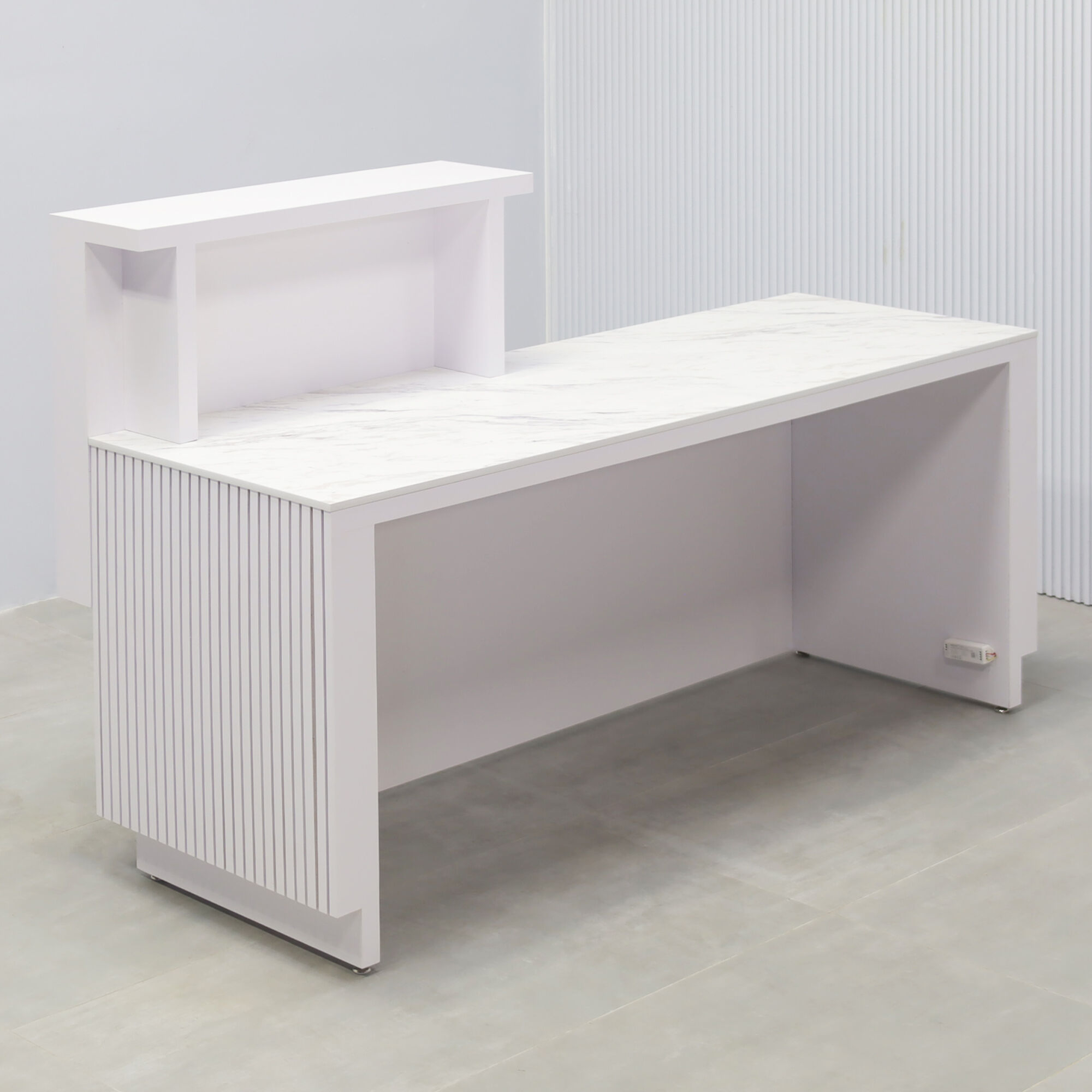 72-inch Los Angeles Reception Desk with  white matte laminate counter & toe-kick, white matte tambour with natural mdf desk, calcutta stone engineered surface desk top.