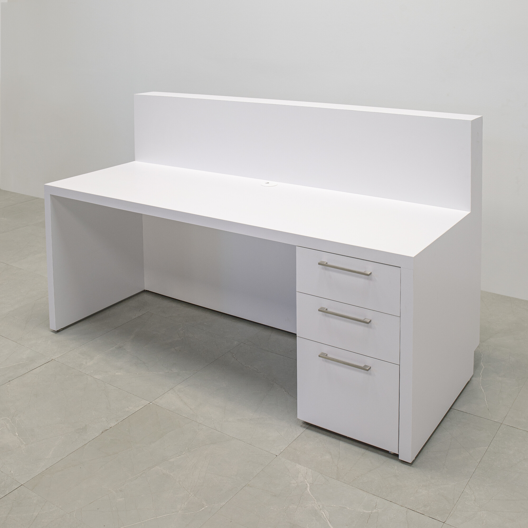 72-inch Dallas Straight Custom Reception Desk in white matte laminate main desk and brushed aluminum toe-kick, with color LED, and built-in storage on right side when sitting, shown here.