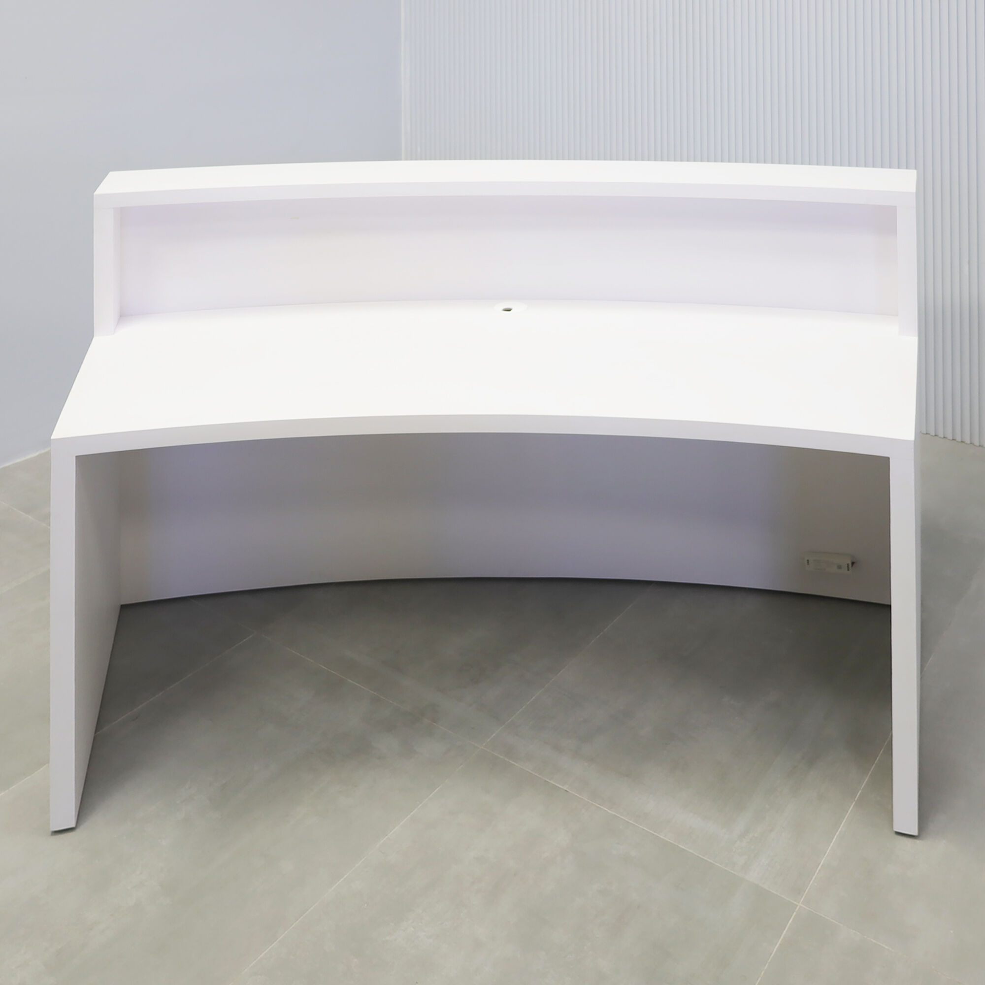 72-inch Seattle X2 Reception Desk in white matte PVC main desk, calcutta blanc engineered surface slats curved front panel, and warm white LED.