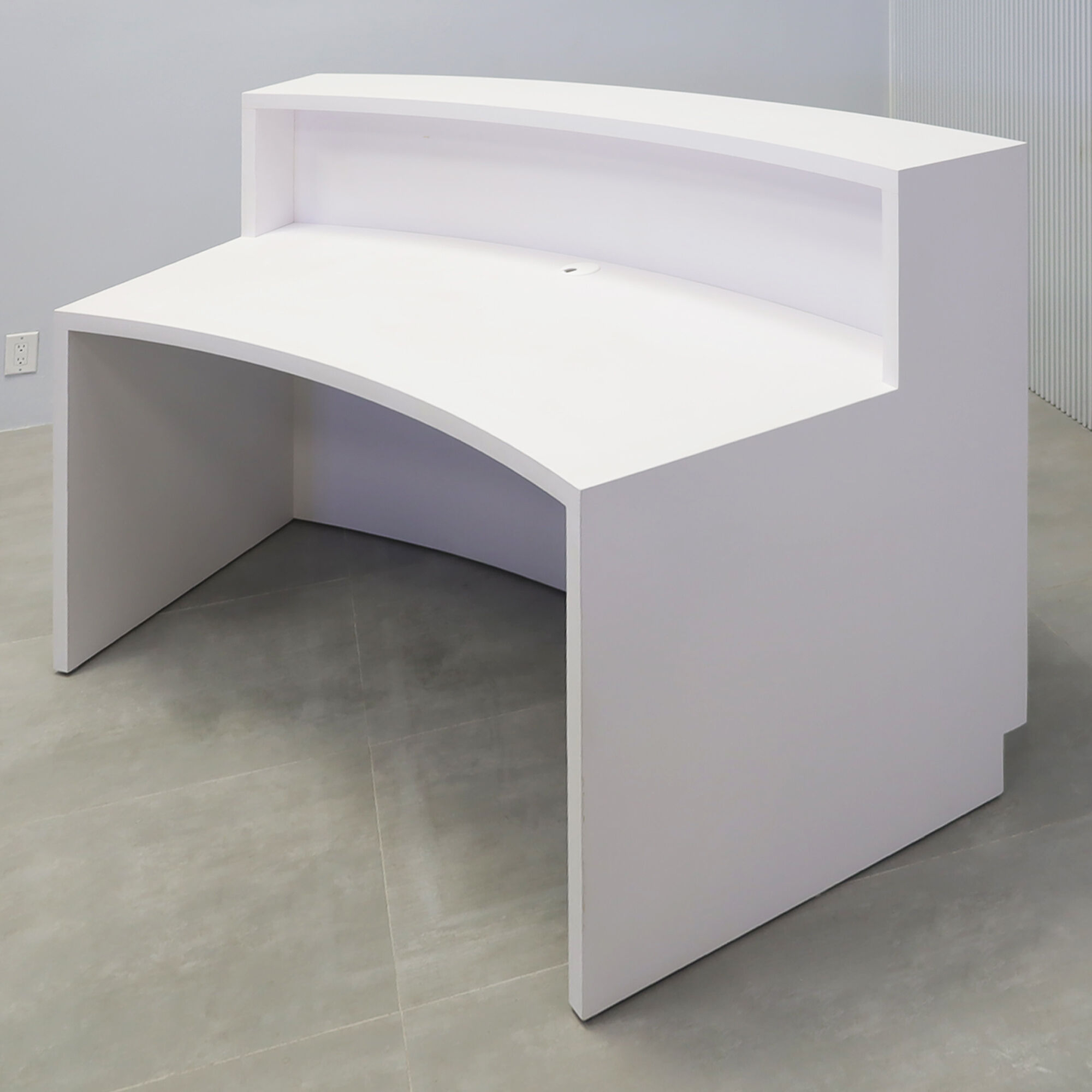 72-inch Seattle X2 Reception Desk in white matte PVC main desk, calcutta blanc engineered surface slats curved front panel, and warm white LED.