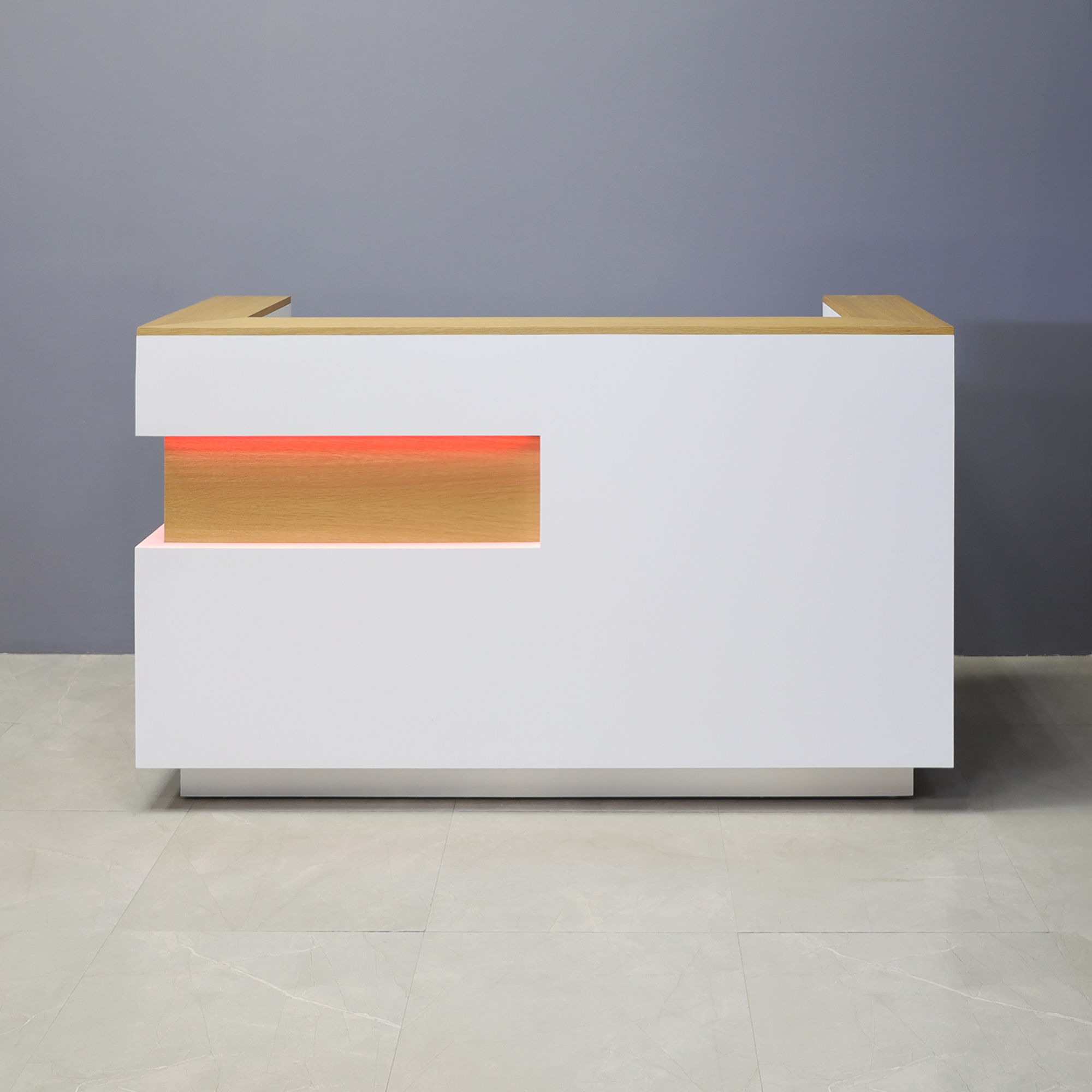 72-inch Manhattan U-Shape Reception Desk in maple veneer top and accent panel, white matte laminate main desk and brushed aluminum laminate toe-kick, with color LED shown here.