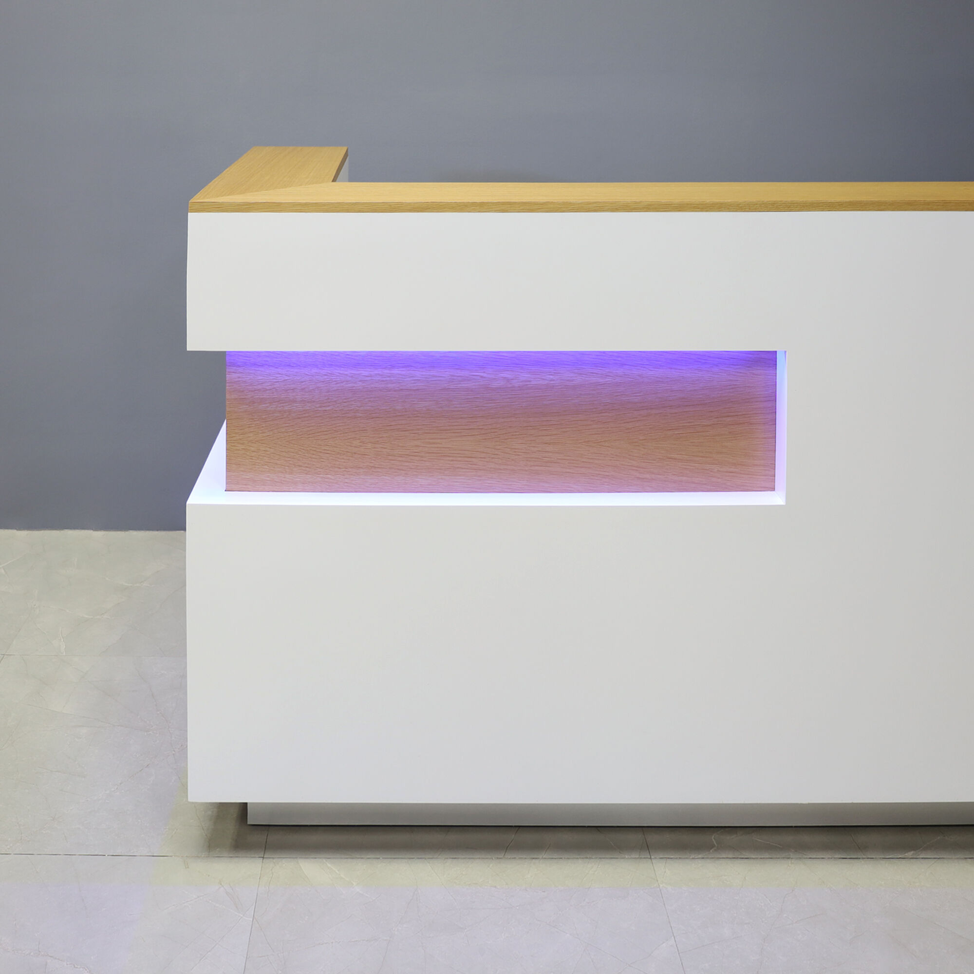 72-inch Manhattan U-Shape Custom Reception Desk in white oak veneer accent panel and top counter, and white matte laminate main desk, with white LED, shown here.