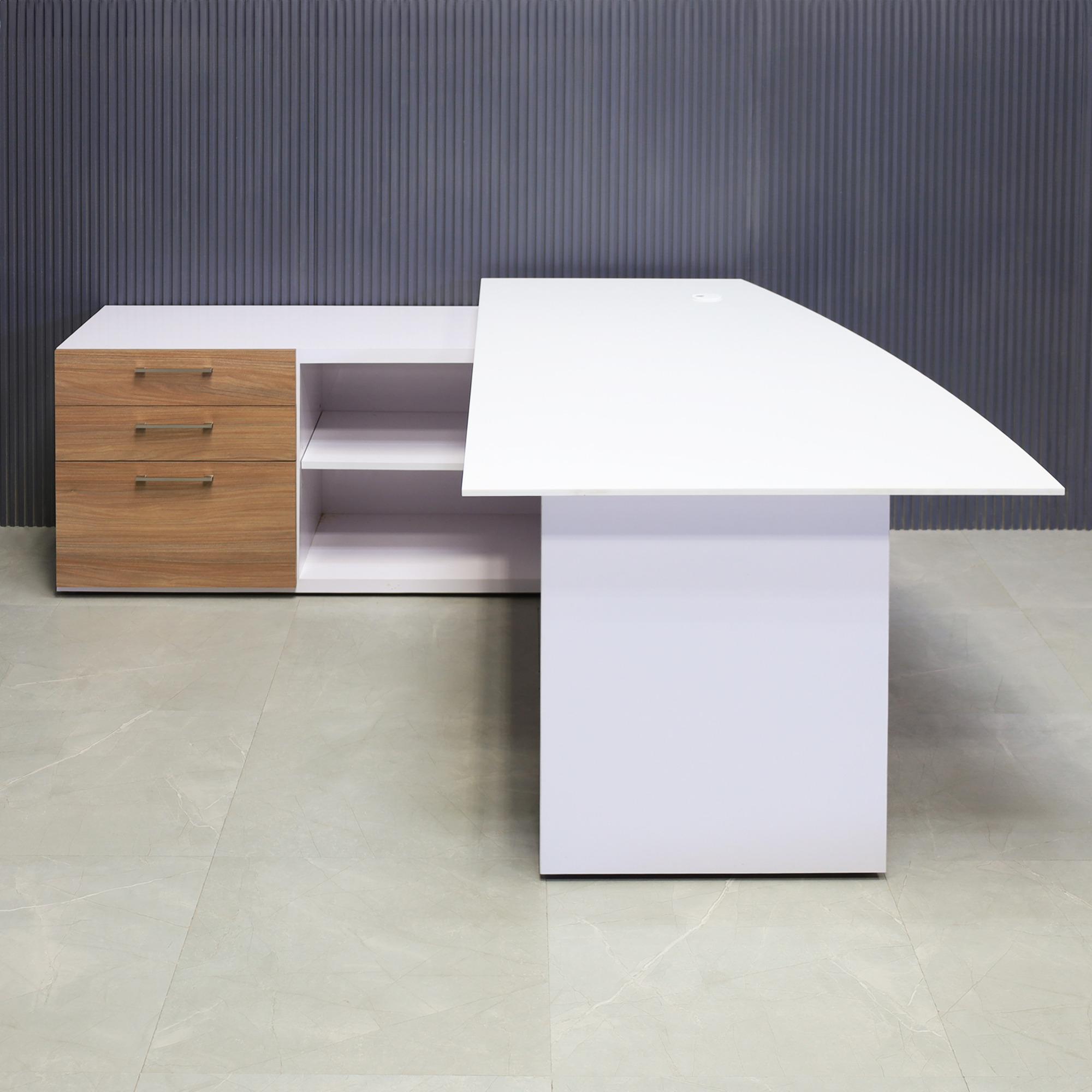 72-inch Avenue Curved Executive Desk with Credenza in 1/2-inch white solid engineered surface top, white gloss laminate credenza & leg, and uptown walnut matte laminate privacy panel and front drawers.