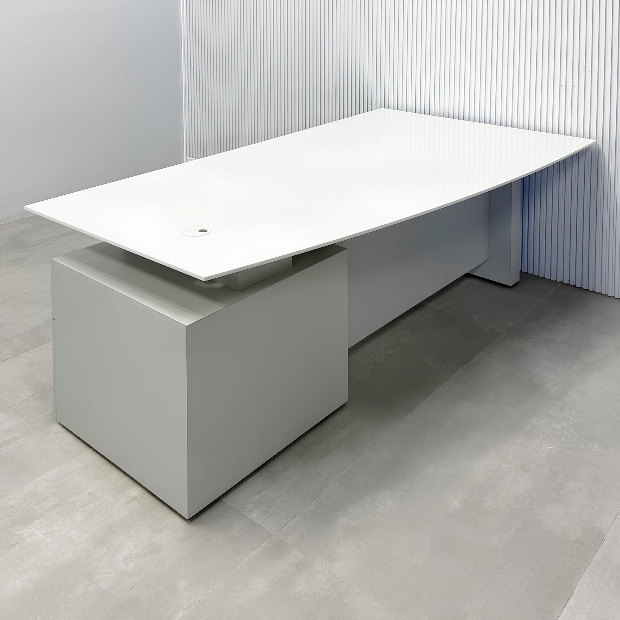 72-inch Avenue Curved Executive Desk with white solid engineered surface top, folkstone gray base & cabinet, and folkstone gray privacy panel.