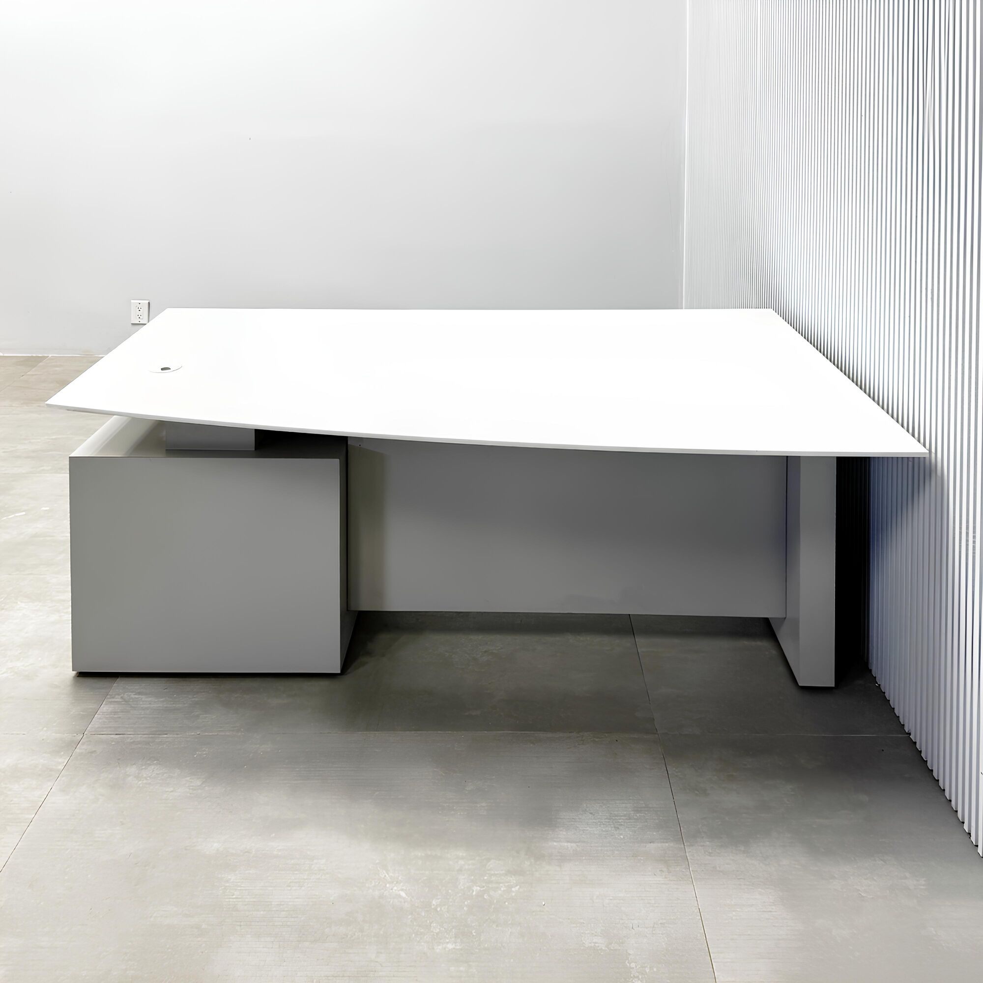 72-inch Avenue Curved Executive Desk with white solid engineered surface top, folkstone gray base & cabinet, and folkstone gray privacy panel.