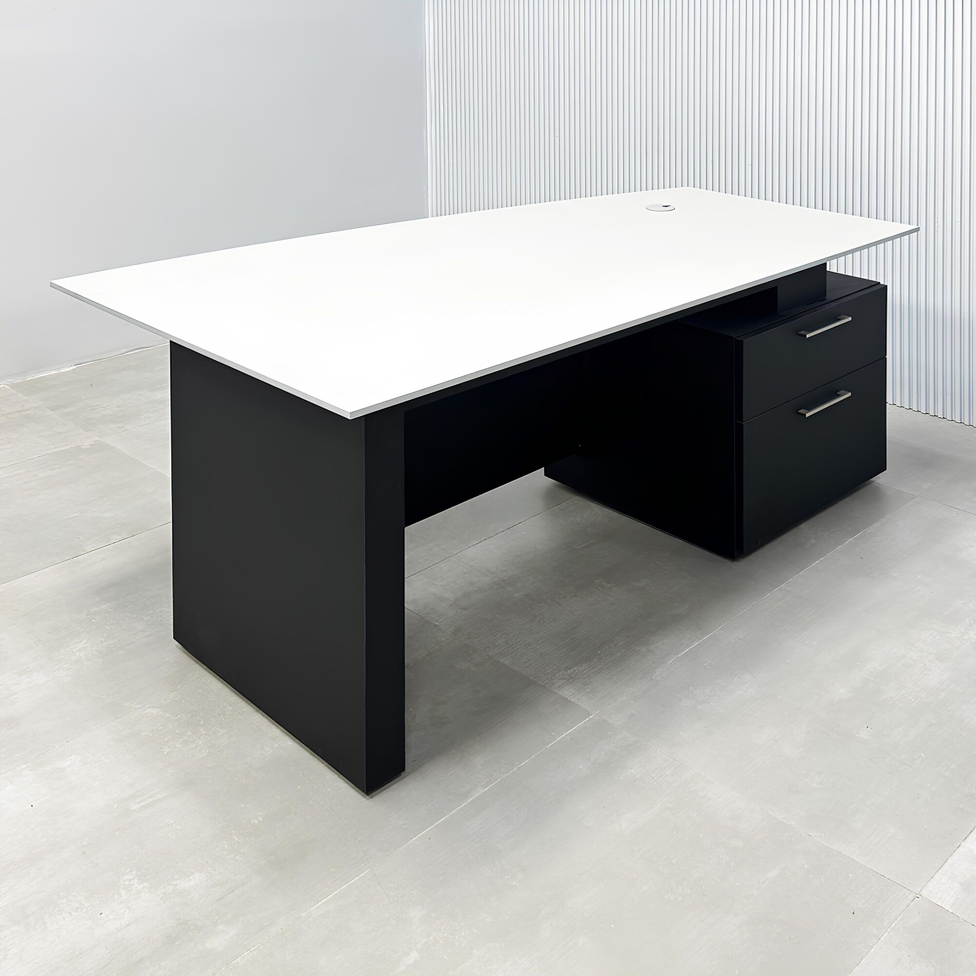 Avenue Straight Executive Desk with light gray traceless engineered surface top, black traceless laminate base & cabinet, and black traceless laminate privacy panel.