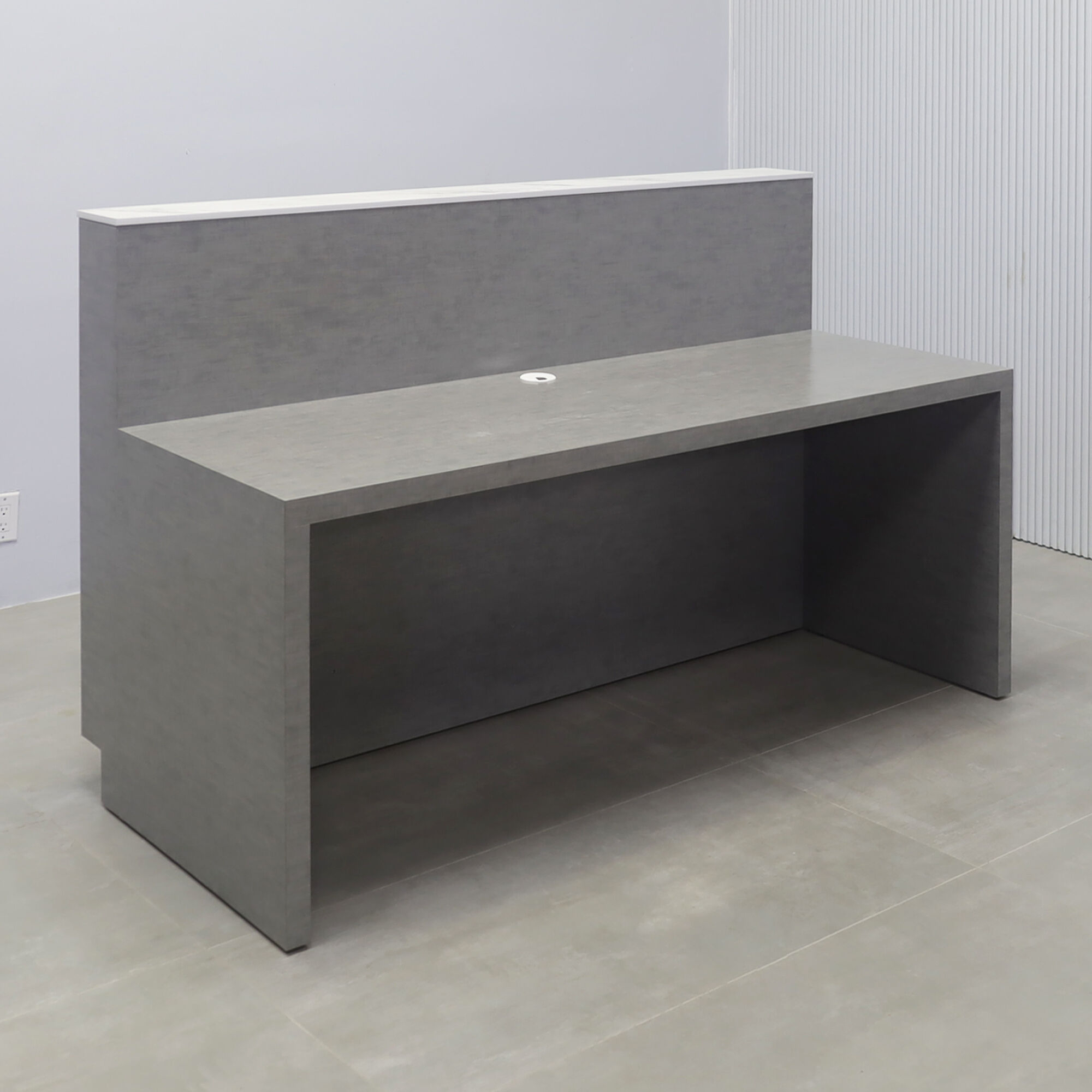 72-inch Dallas Straight Reception Desk with calcutta engineered surface top, white gloss tambour front, silver alchemy laminate workspace & toe-kick.