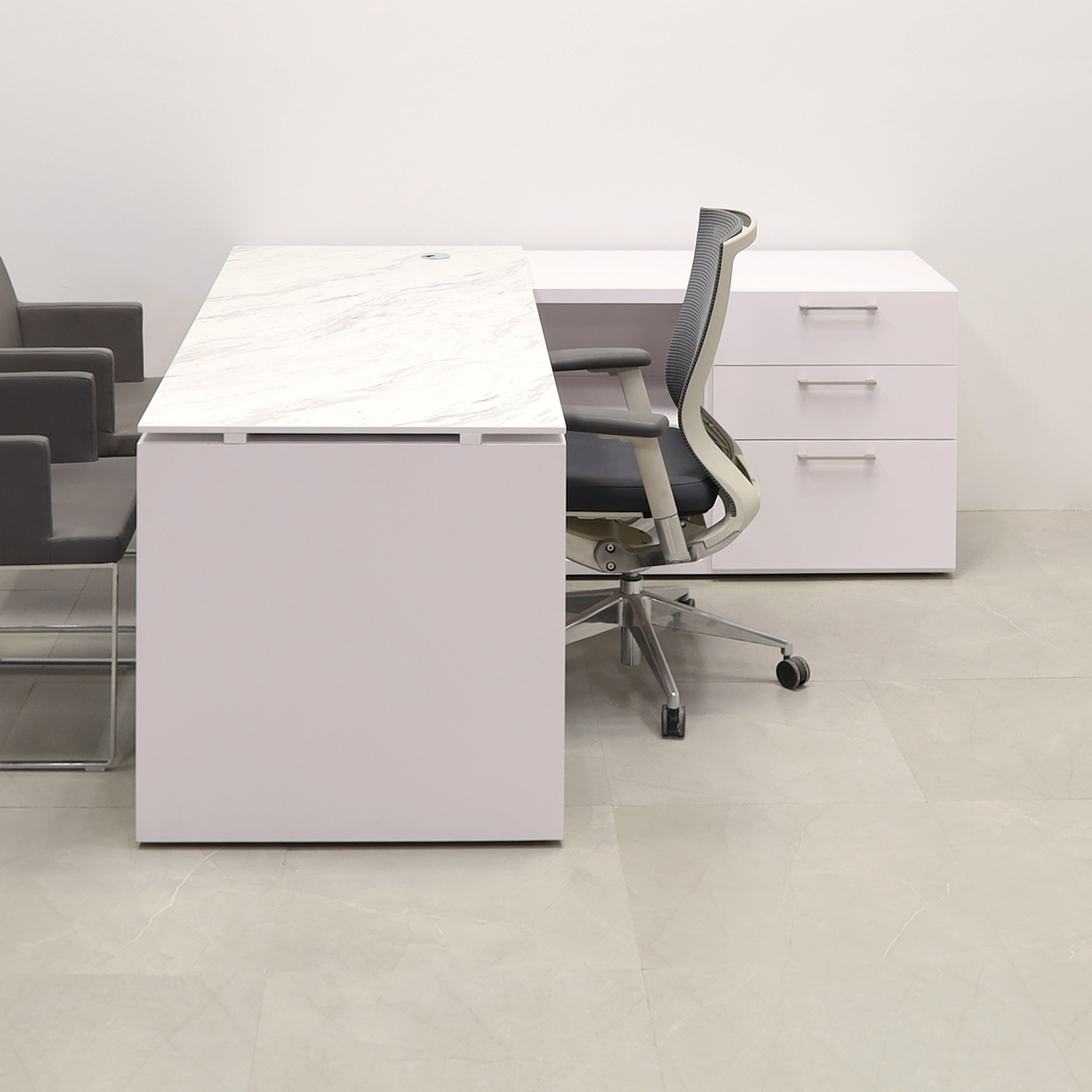 72 inches Calcutta Blanc Engineered Stone Top and White Matte Laminate base and credenza, with two pencil drawers, one file cabinet and one shlef shown here.