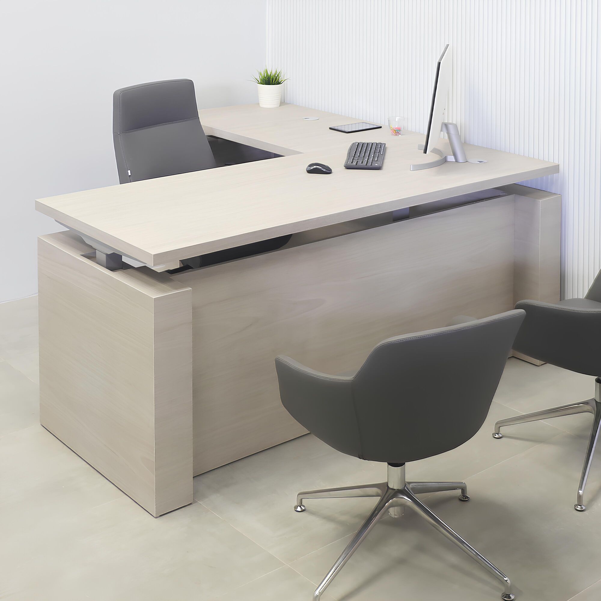 72-inch Denver L-Shape Executive Desk with Sit-stand mechanism, gray oak PVC matte laminate top, gray oak PVC matte laminate storage & privacy panel.
