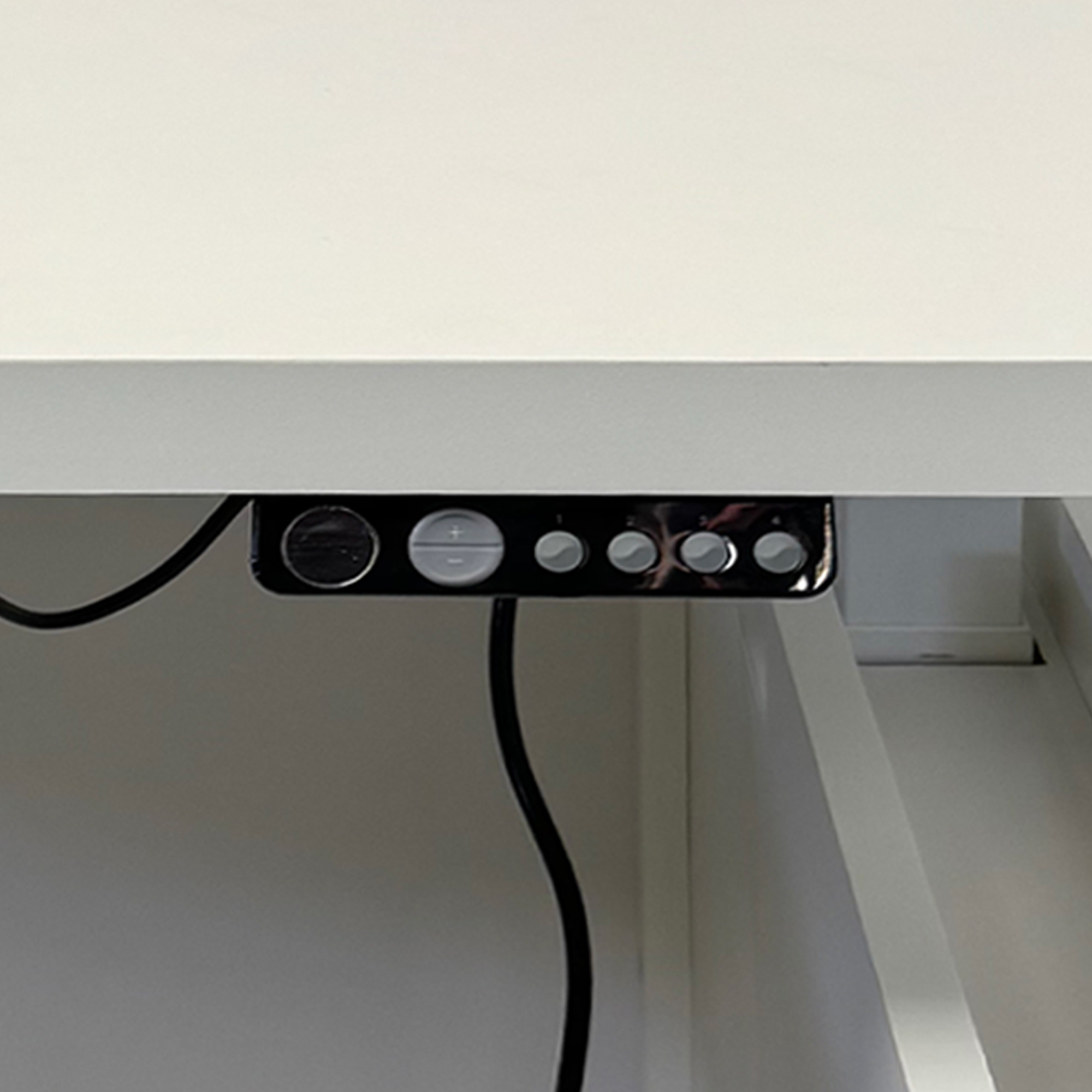 80-inch Denver L-Shape Laminate Executive Desk with Sit-Stand Mechanism with Dover Off-White matte laminate top and base. Washed Oak tambour privacy panel and white base.