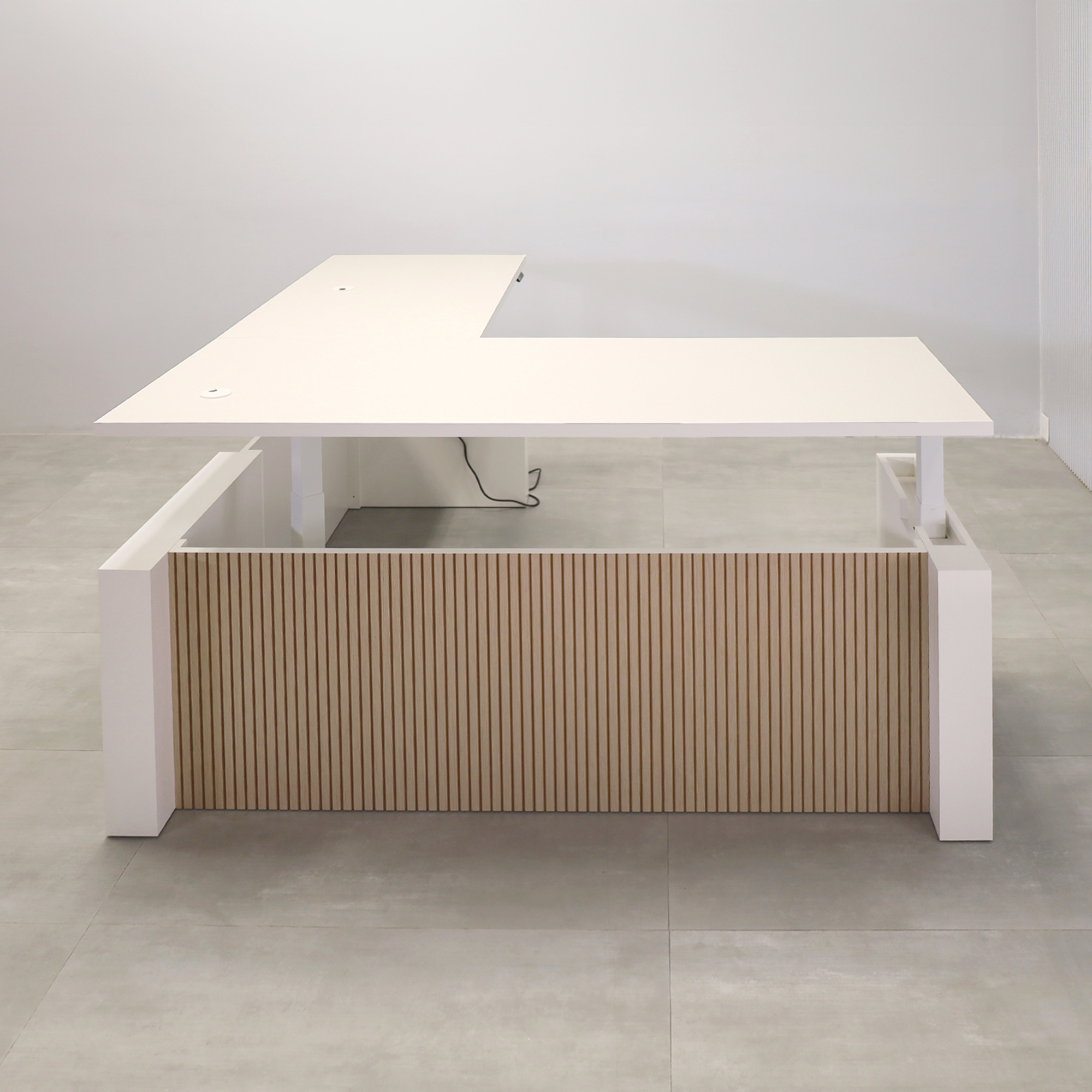 80-inch Denver L-Shape with Sit-Stand Mechanism and Dover Off-White matte laminate Top, Dover Off-White matte laminate Base, Washed Oak & Natural tabour privacy panel, and White metal powder coated legs.