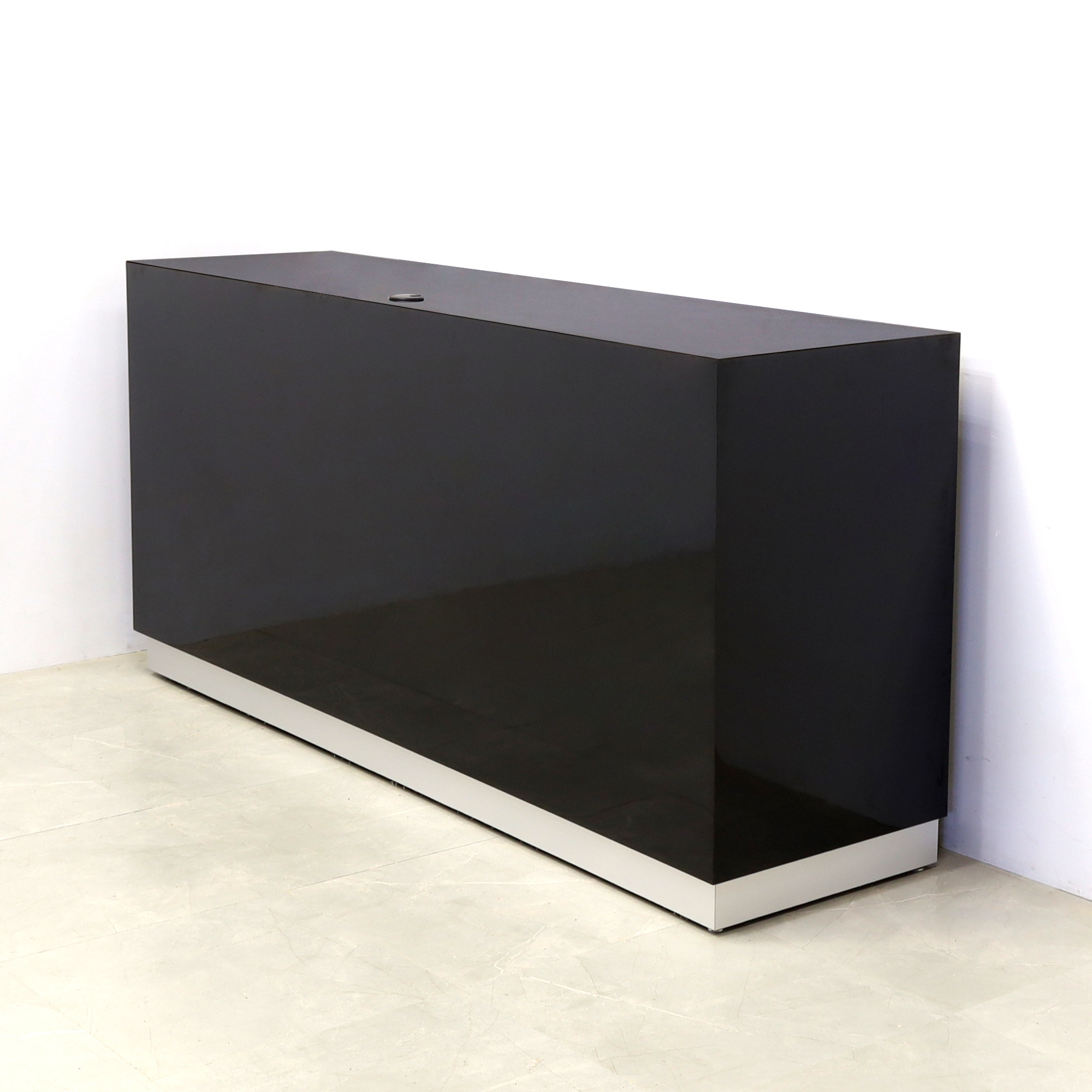 84-inch Houston Custom Reception Desk in black gloss laminate main desk and brushed aluminum toe-kick, shown here.
