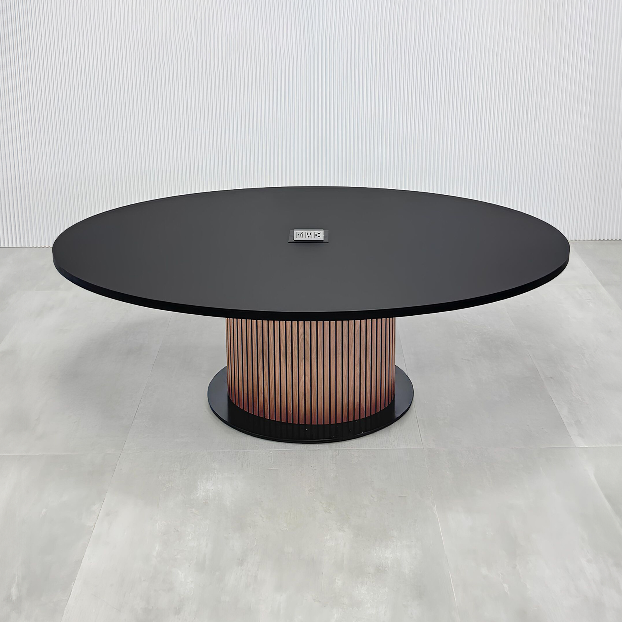 84-inch Newton Oval Conference Table with laminate top and X3 Base with black traceless laminate top, walnut tambour with black background pedestal, black metal powder coated base, and mx2 in black.
