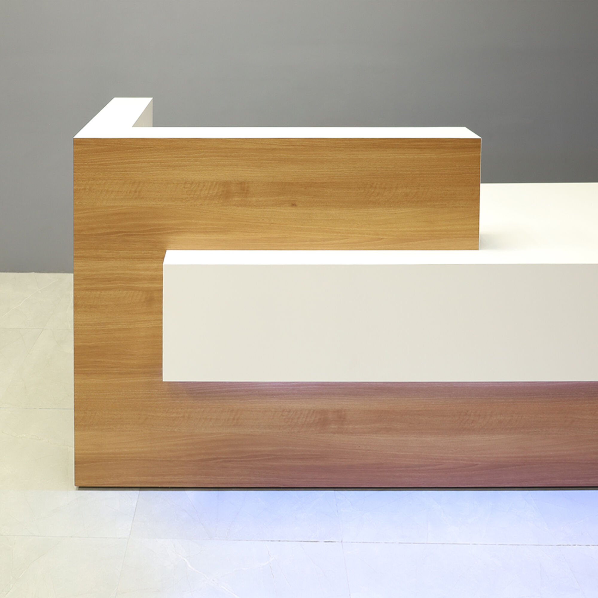 84-inch Atlanta Reception Desk in brazilwood countertop & base, dover off-white matte laminate workspace & front accent, with multi-colored LED, shown here.