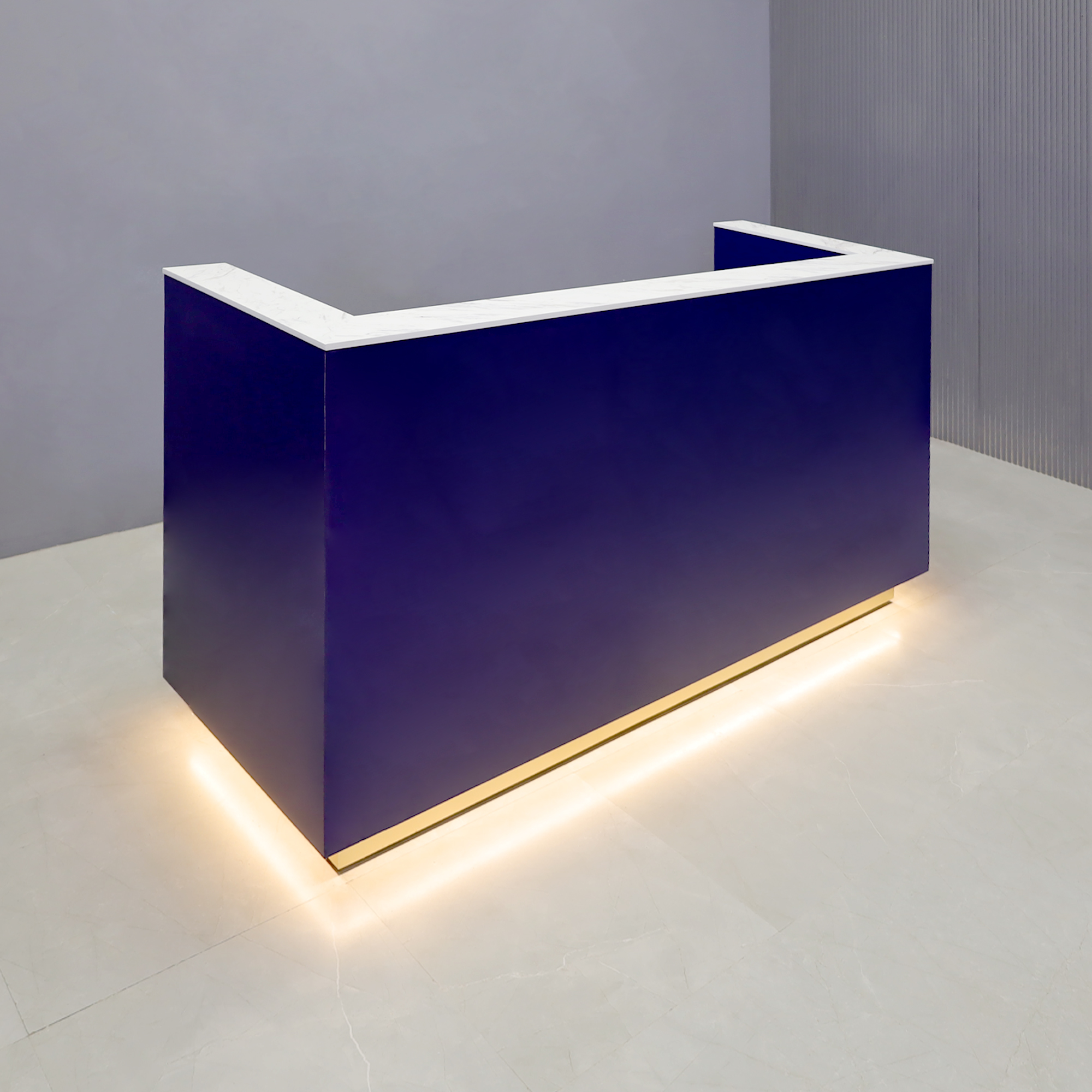 84-inch Dallas U-Shape Reception Desk with Calcutta Blanc top, Navy Blue Laminate main desk, Brushed Gold Aluminum toe-kick, and warm white LED. 