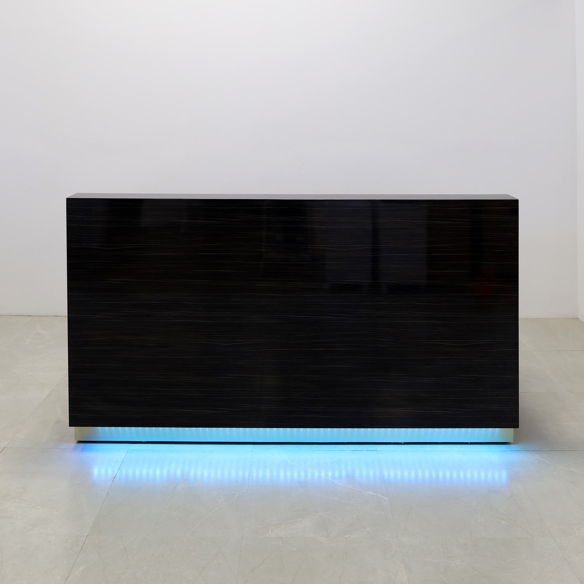 84-inch Dallas Straight Custom Reception Desk in special madagascar gloss laminate main desk and bruhed aluminum toe-kick, with color LED, shown here.