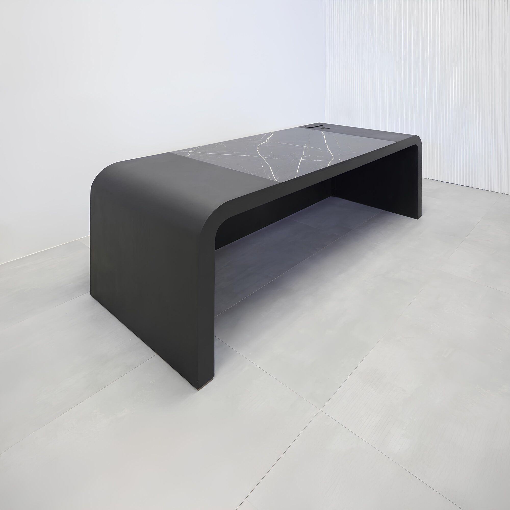 84-inch Milano Curved Executive Desk with Pietra Noir engineered surface top, Ebony wood veneer desk & panel, and Ebony tambour veneer privacy panel.