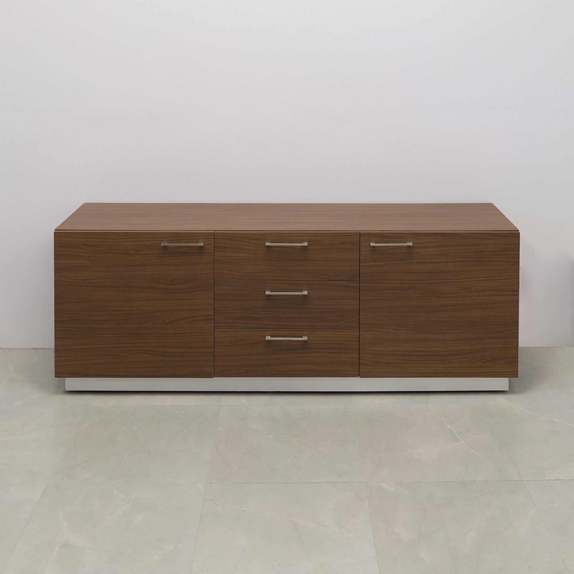 84-inch Manhattan Storage Credenza in walnut heights matte laminate credenza, front drawers & doors, and brushed aluminum toe-kick, shown here.