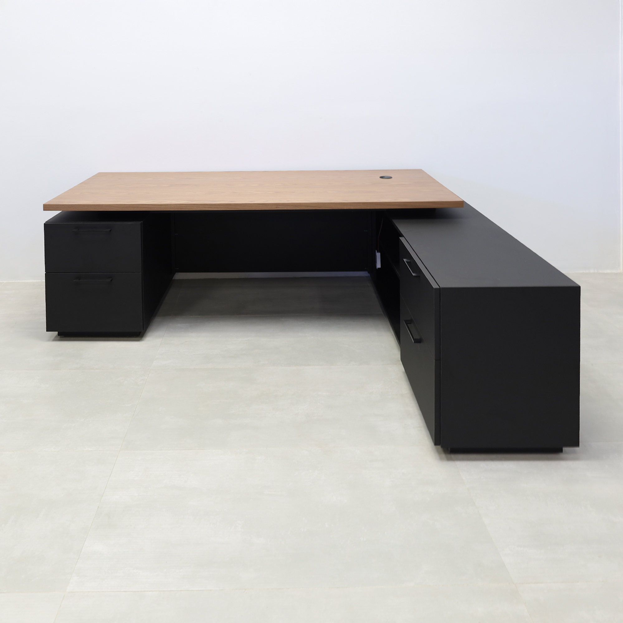 84-inch Napa Executive L-Shape Desk with walnut wood veneer top, black traceless laminate main body, and black traceless laminate toe-kick.