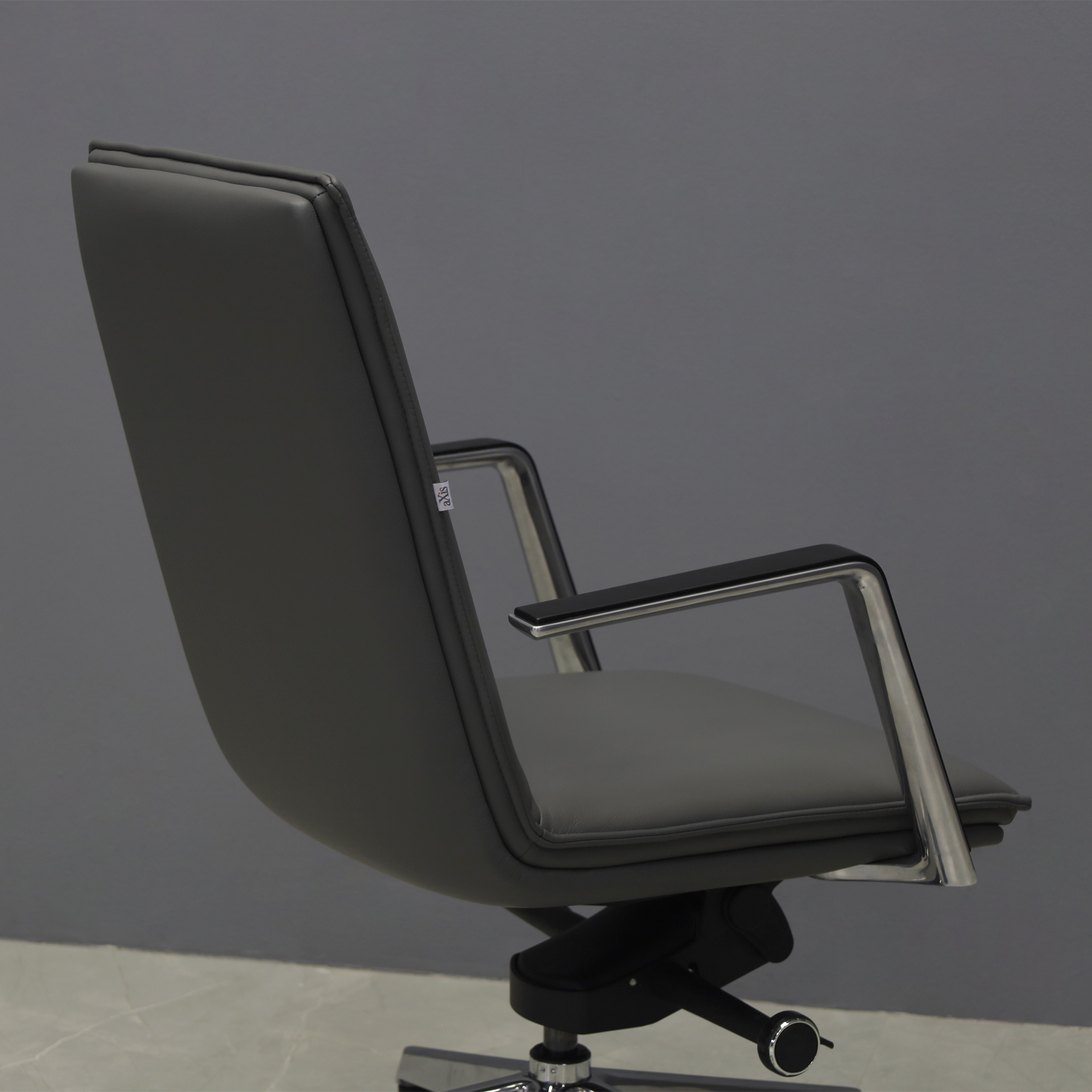 Casoni Conference and Task Chair in gray upholstey, shown here.