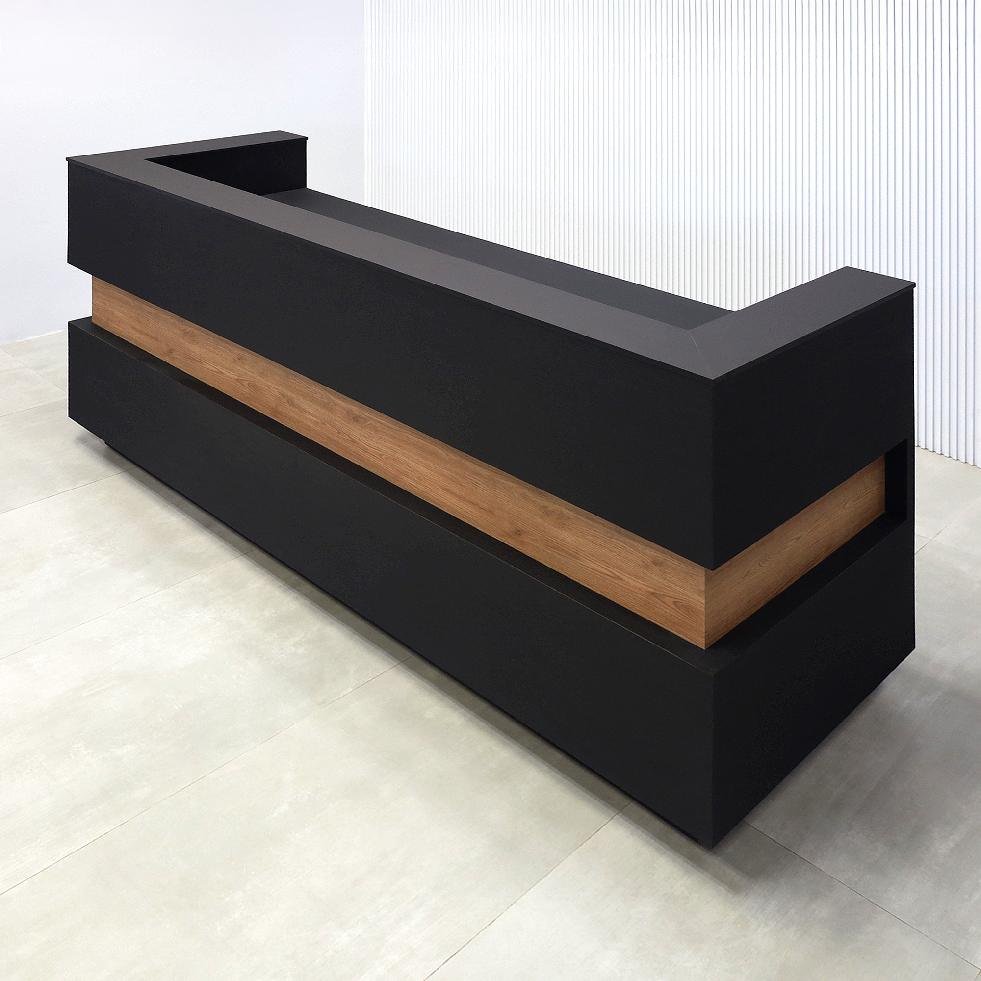 90-inch Pensacola Reception Desk with Black Cinder matte laminate desk and toe-kick. Spiced Chestnut laminate accent, Black traceless engineered surface top, and White LED.