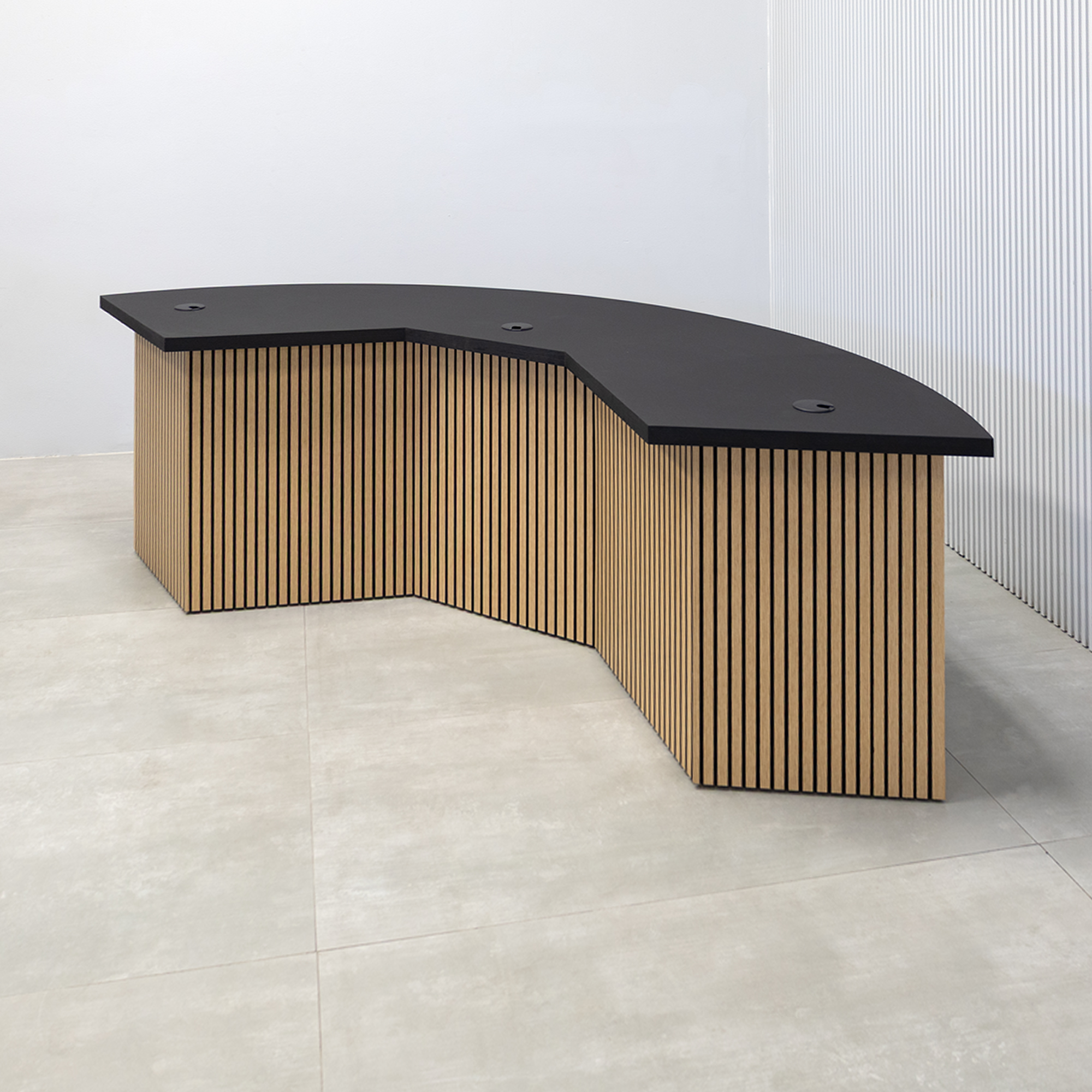 90-inch Tampa Bay Podcast Table with Black Cider matte laminate top, White Oak tambour & Black background front base, Black matte laminate back base. 
