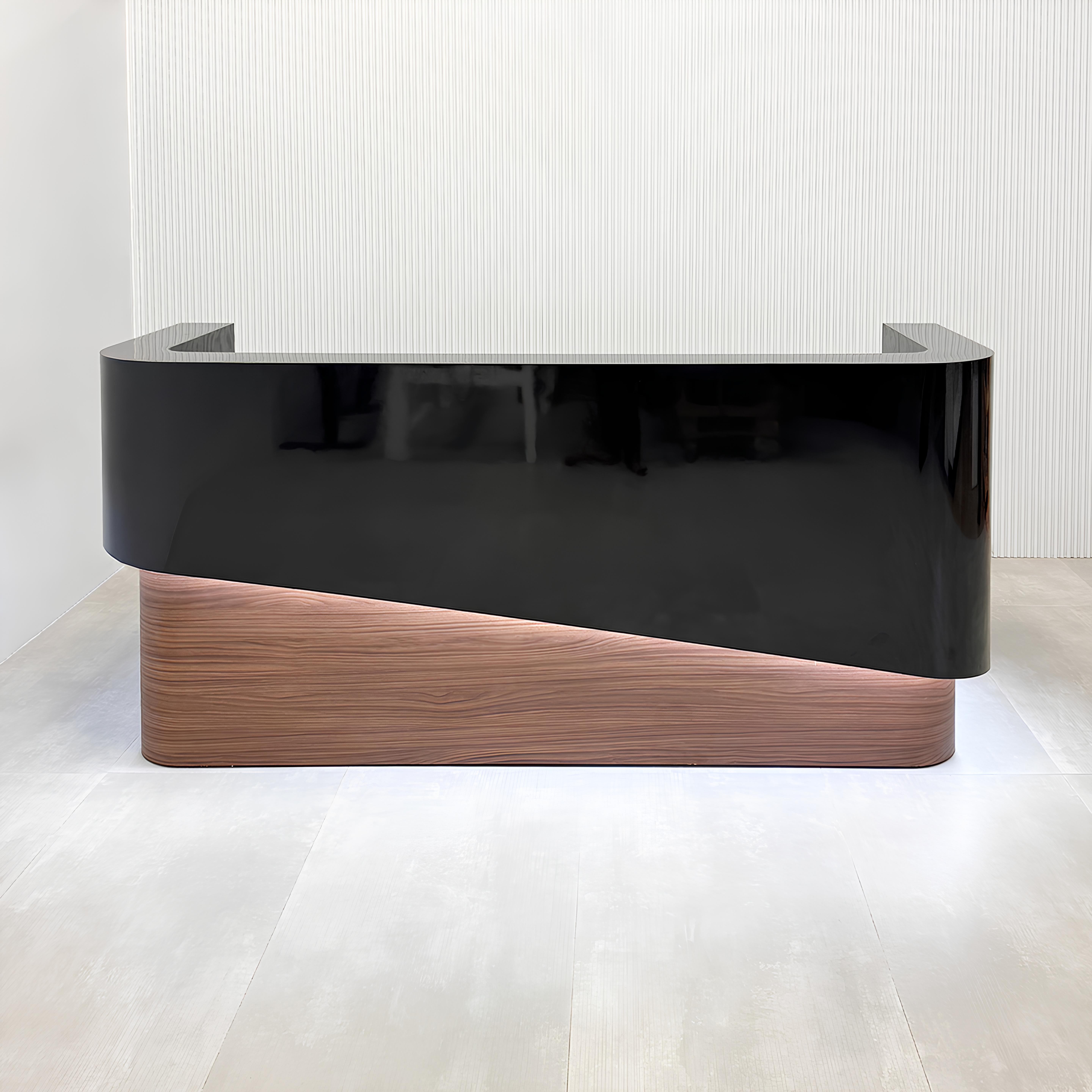 90-inch Nola Curved Custom Reception Desk with black gloss laminate counter & storage, walnut heights matte laminate bottom, black gloss laminate workspace, and white warm LED.