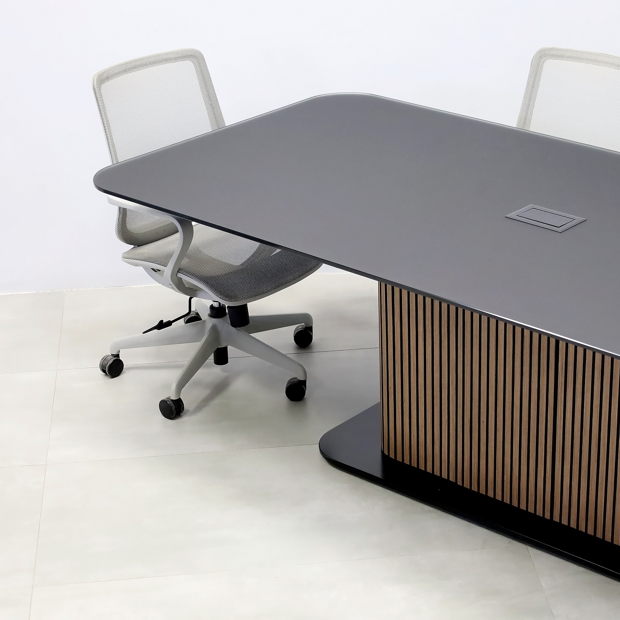 90-inch Omaha Racetrack Conference Table with X3 Base with Black Satin tempered glass top, Spiced Walnut & Black background tambour pedestal, Black powder coated base, and Mx2 power box.