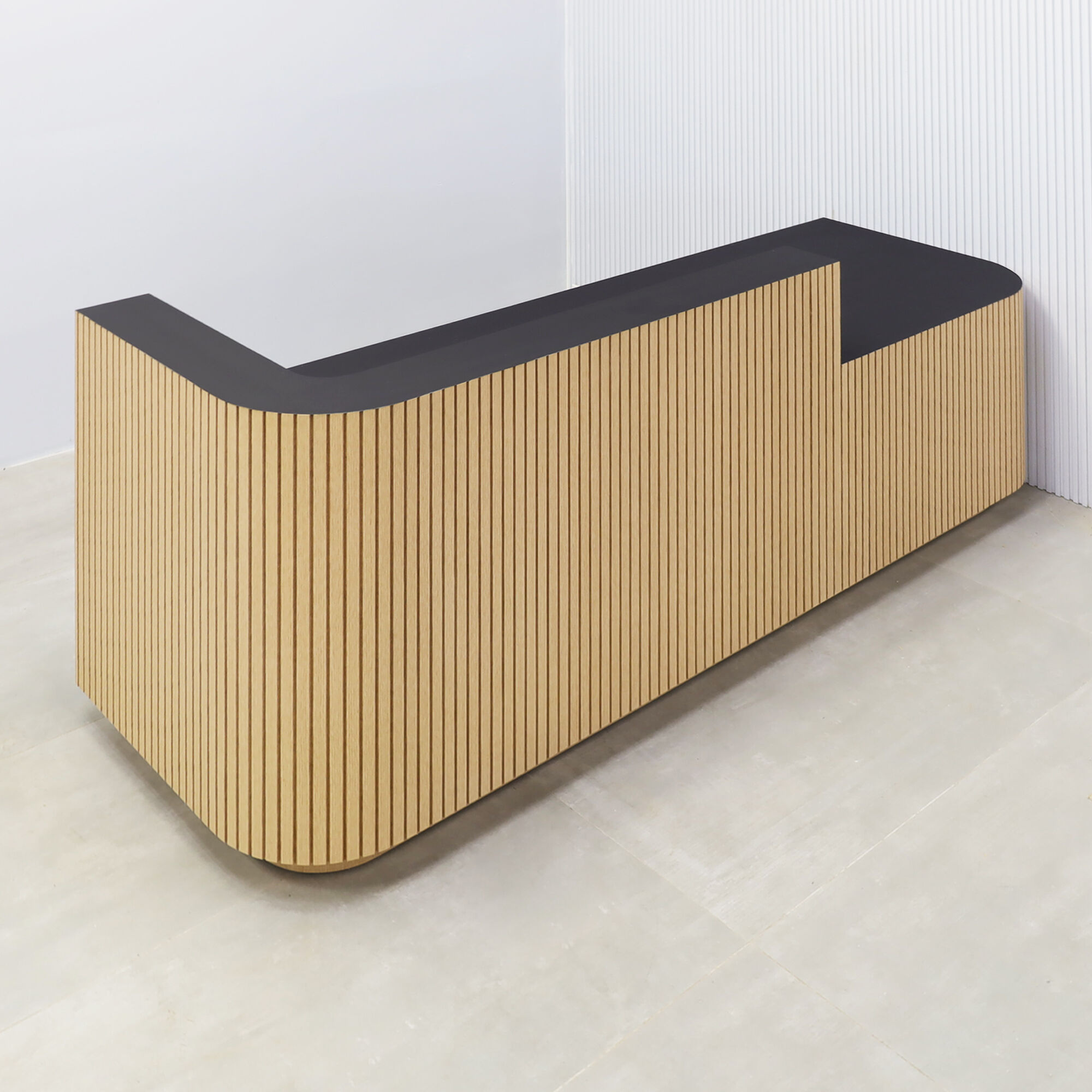 90-inch Nola Low Counter Reception Desk with black traceless laminate desk workspace white oak tambour front toe-kick.