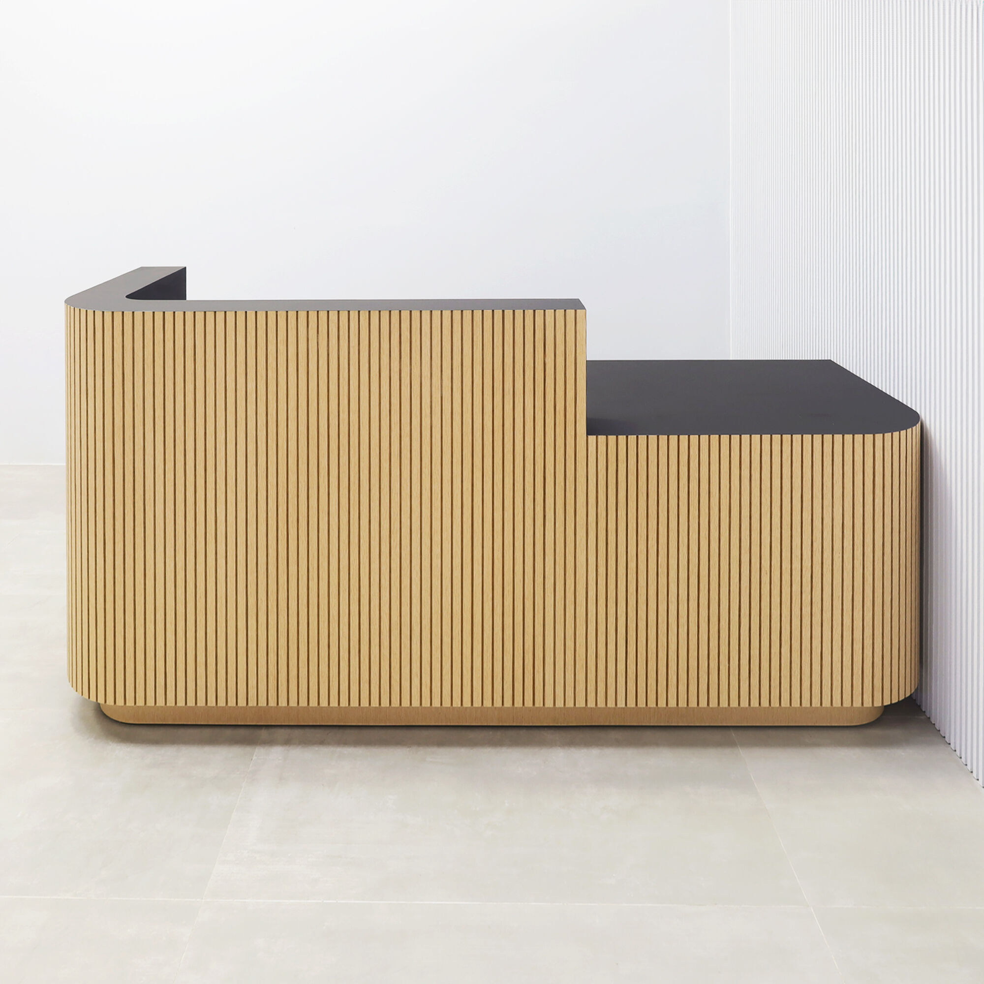 90-inch Nola Low Counter Reception Desk with black traceless laminate desk workspace white oak tambour front toe-kick.