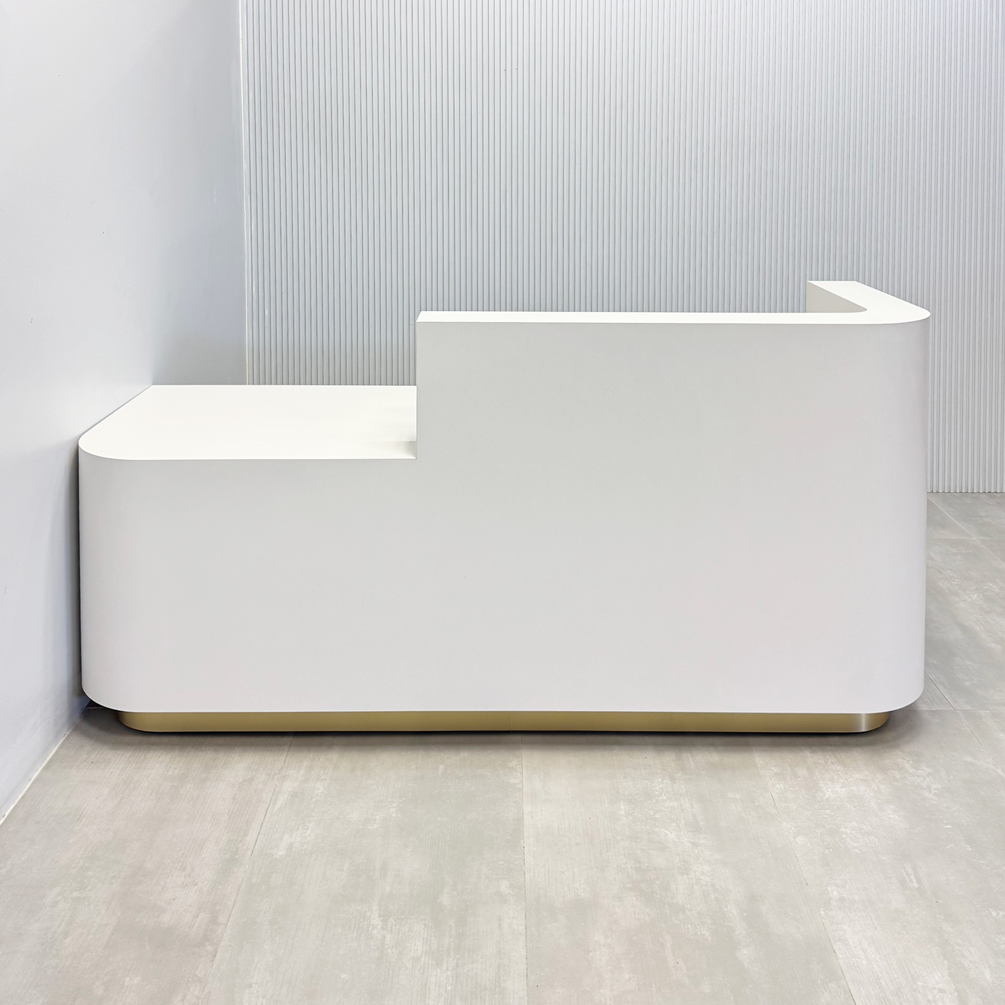 90-inch Nola Straight ADA Reception Desk with white matte laminate workspace, white matte laminate desk, and brushed gold aluminum toe-kick.