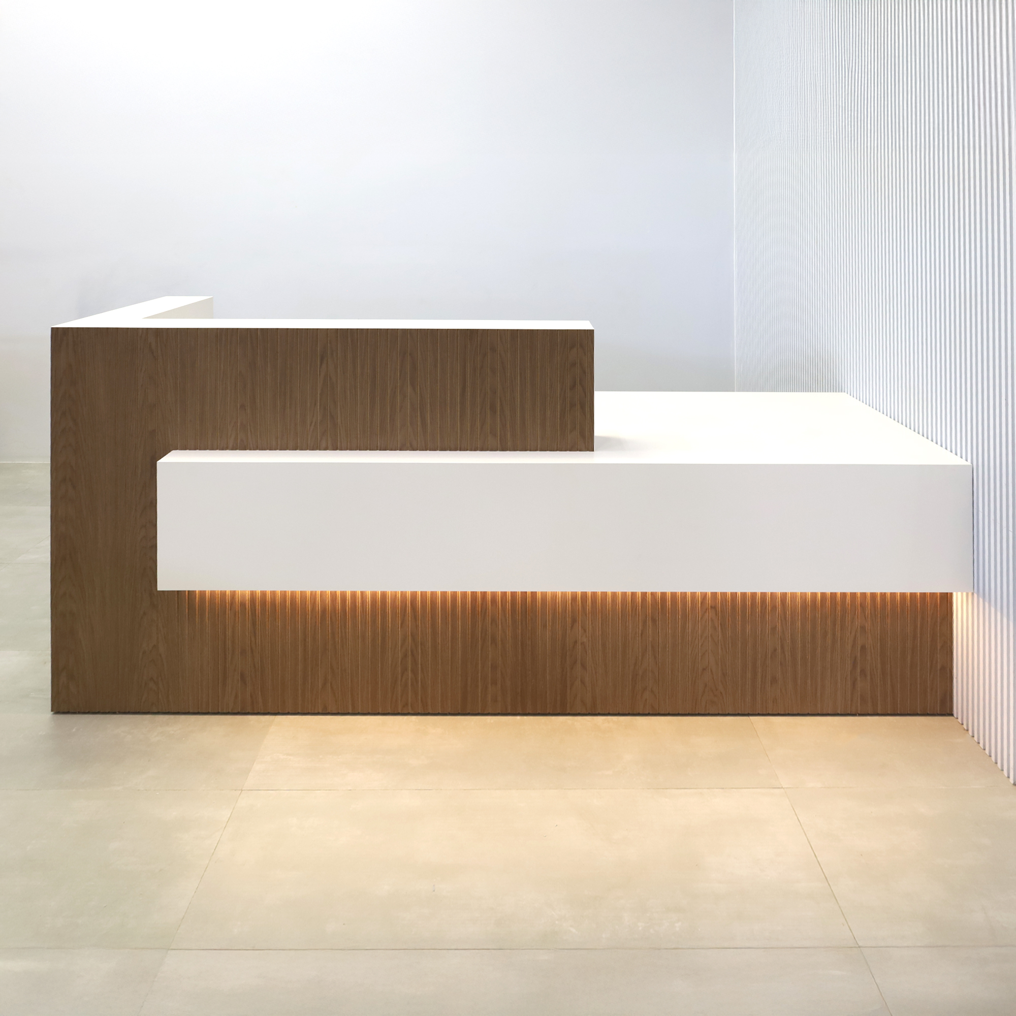 90-inch Atlanta Custom Reception Desk with walnut tambour & natural background desk, Dover off-white matte laminate workspace & storage, Dover off-white matte laminate front accent panel. 