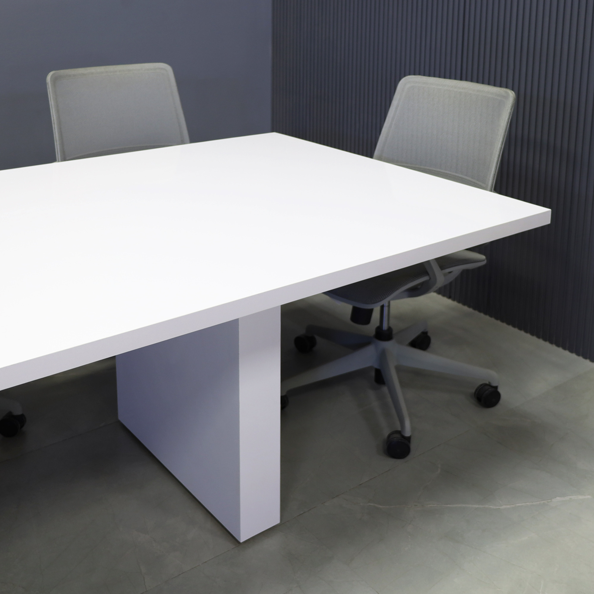 90-inch Newton Rectangular Conference Table in white gloss laminate for the top and base, with one silver MX2 powerbox, shown here.