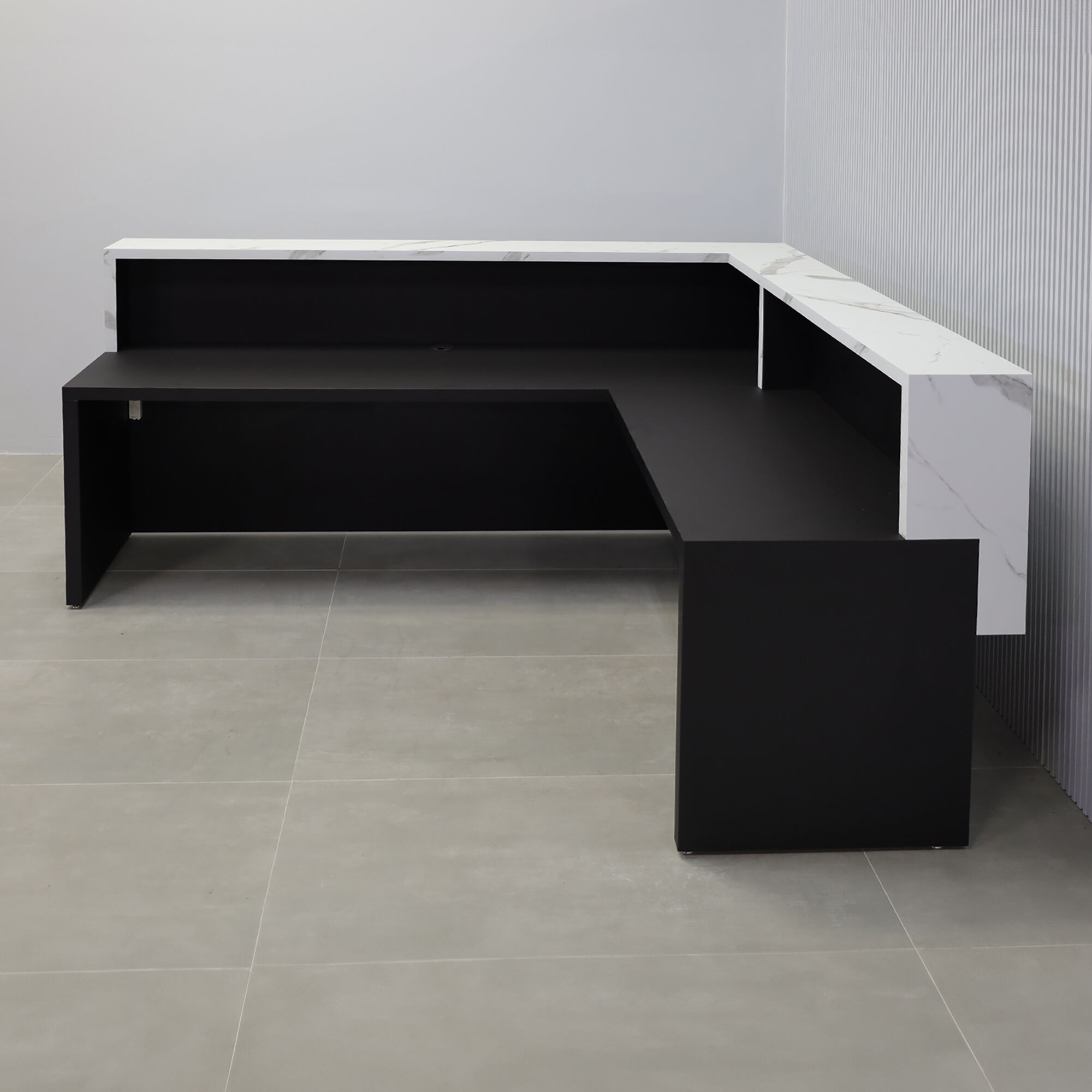 90-inch San Francisco L-Shape Reception Desk with black traceless laminate desk, calcutta stone PVC laminate counter, black traceless laminate workspace, white LED.