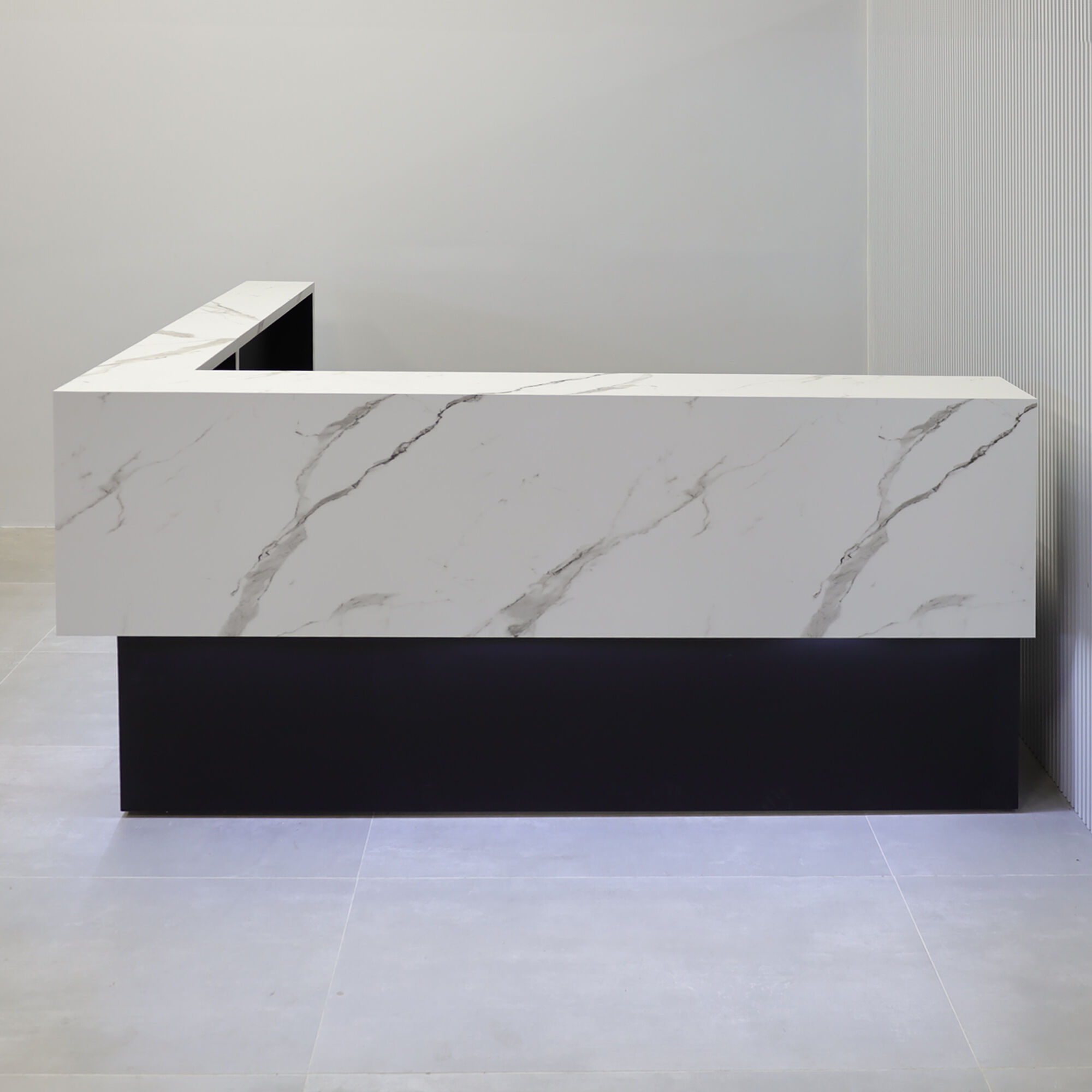 90-inch San Francisco L-Shape Reception Desk with black traceless laminate desk, calcutta stone PVC laminate counter, black traceless laminate workspace, white LED.
